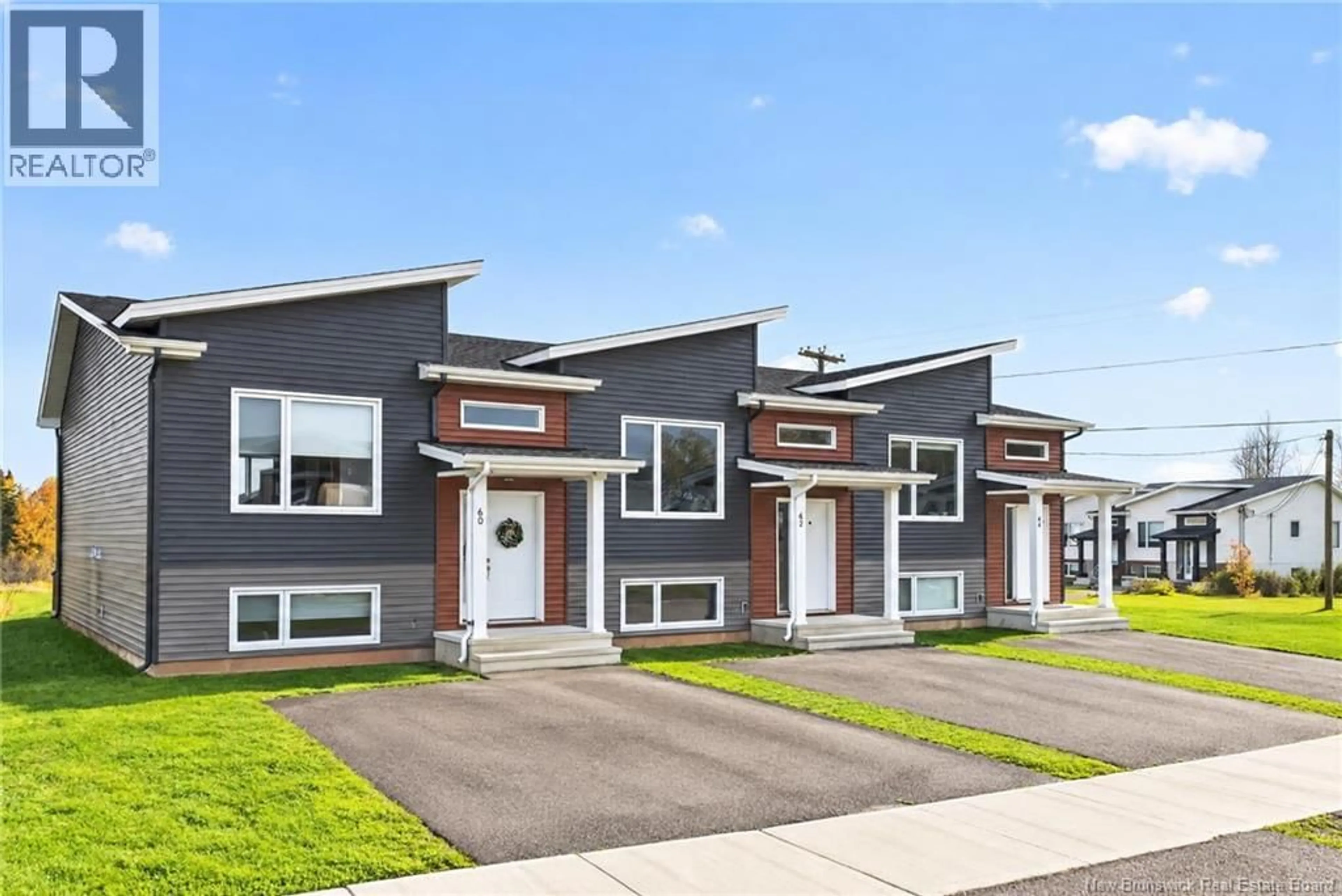 Home with vinyl exterior material, street for 62 AIME STREET, Dieppe New Brunswick E1A9X8