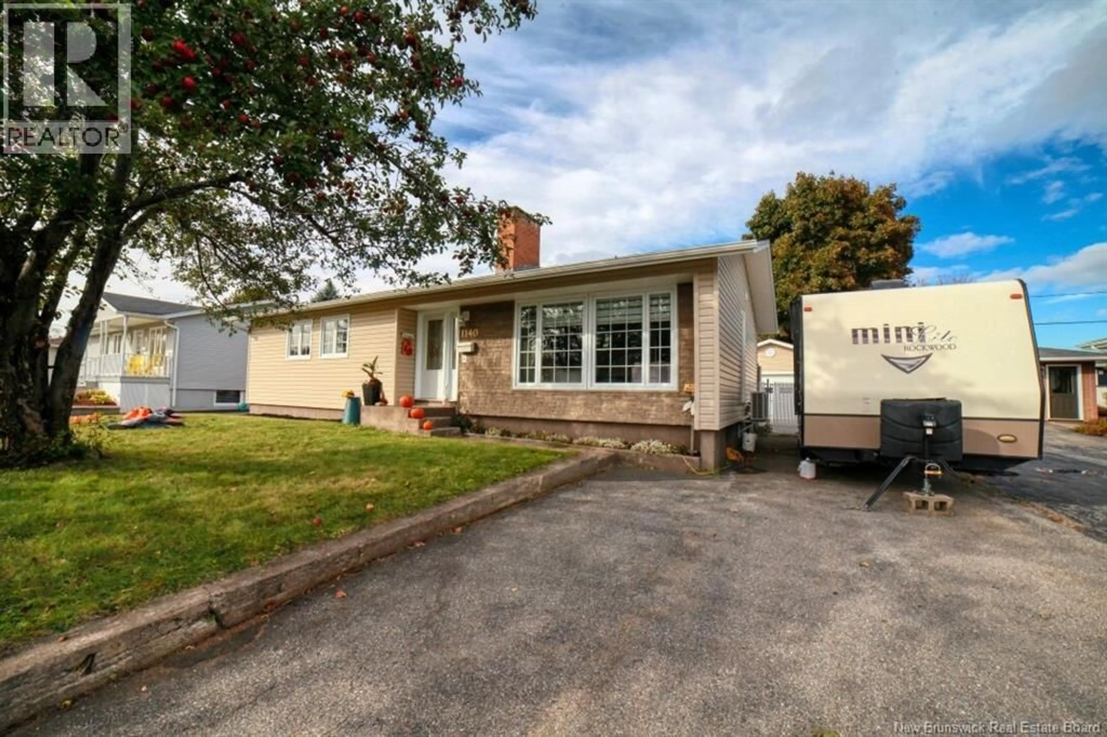 A pic from outside/outdoor area/front of a property/back of a property/a pic from drone, street for 1140 CENTENNIAL, Bathurst New Brunswick E2A4A8