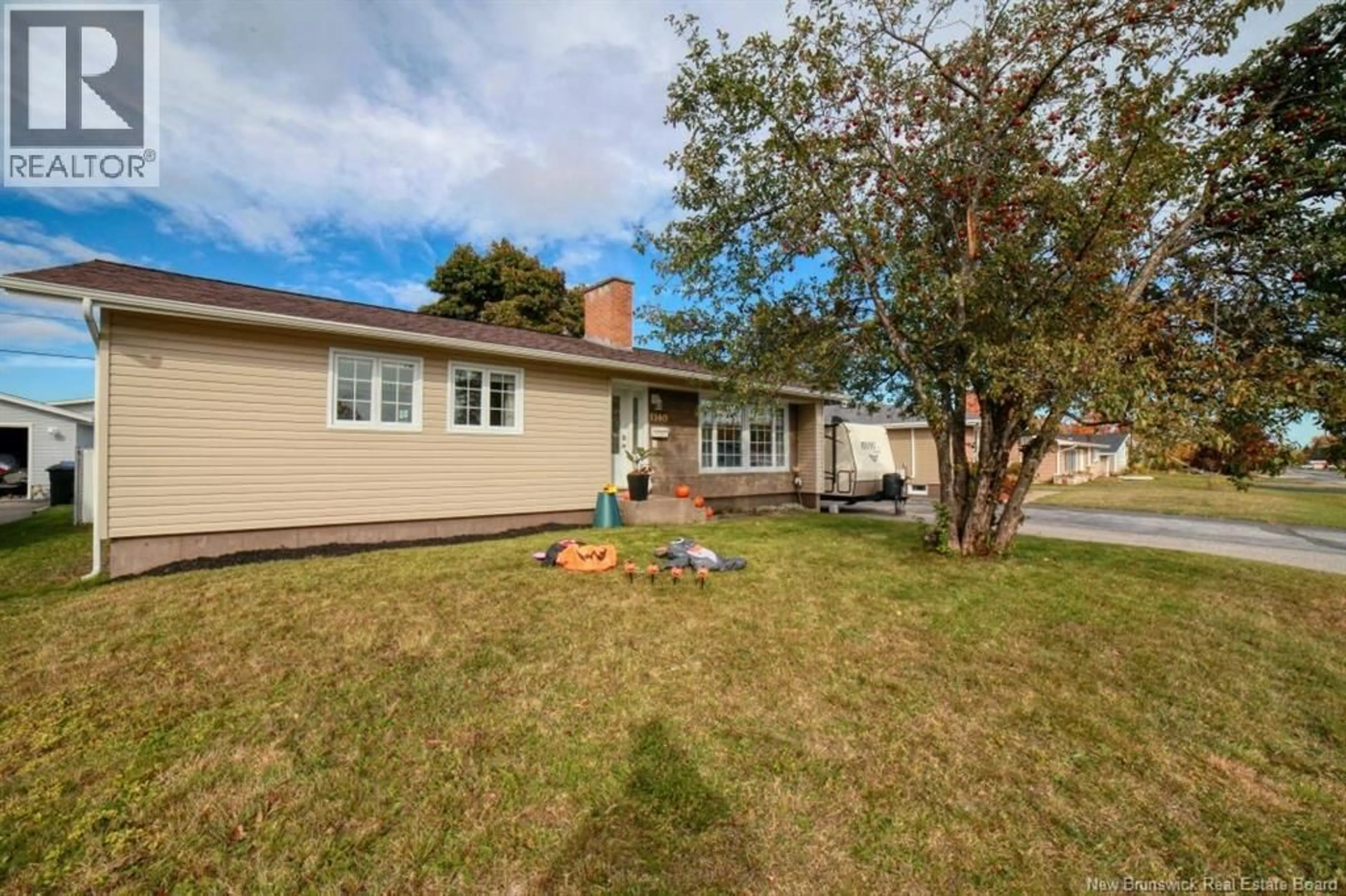 A pic from outside/outdoor area/front of a property/back of a property/a pic from drone, street for 1140 CENTENNIAL, Bathurst New Brunswick E2A4A8