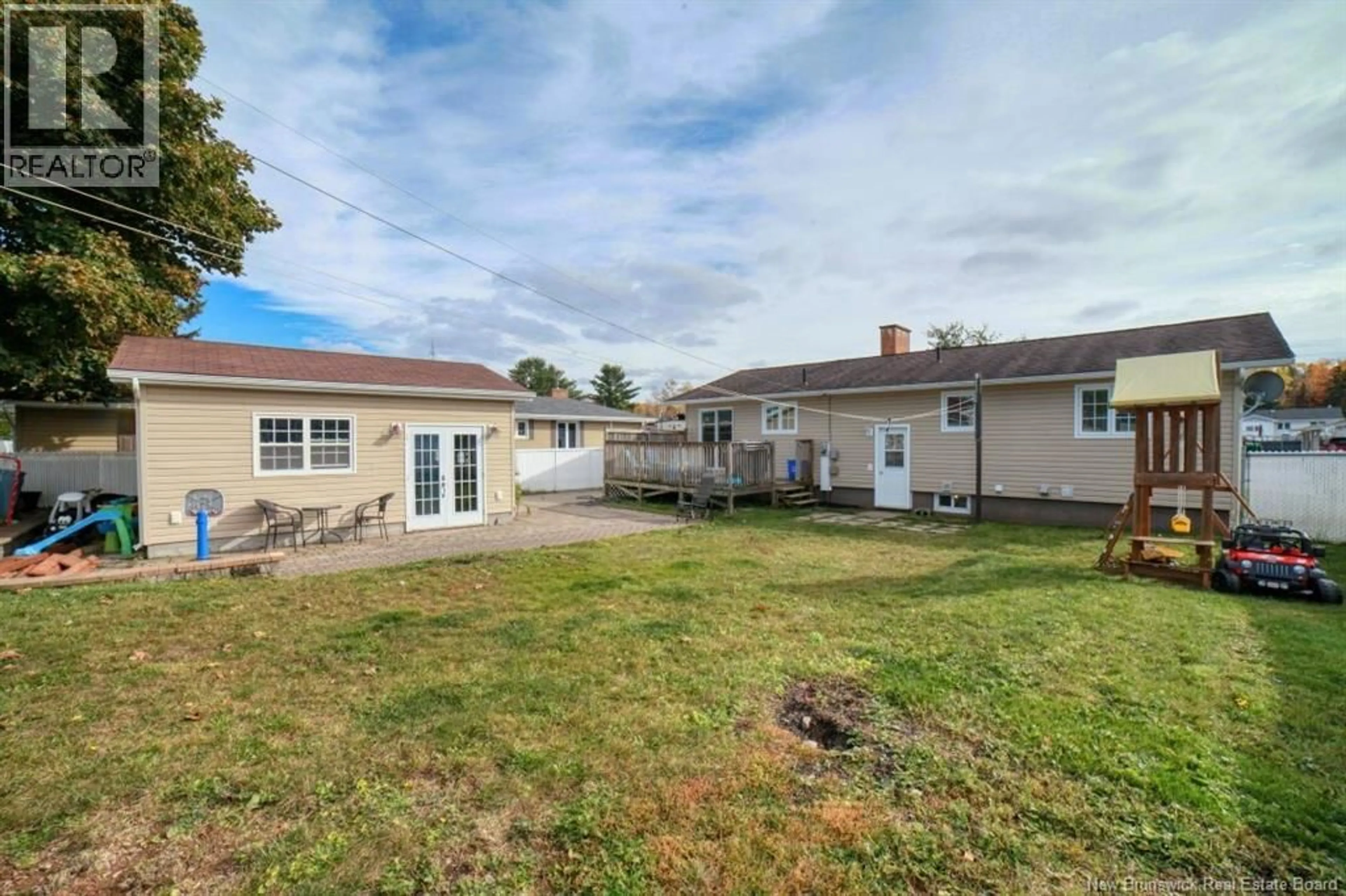 A pic from outside/outdoor area/front of a property/back of a property/a pic from drone, street for 1140 CENTENNIAL, Bathurst New Brunswick E2A4A8