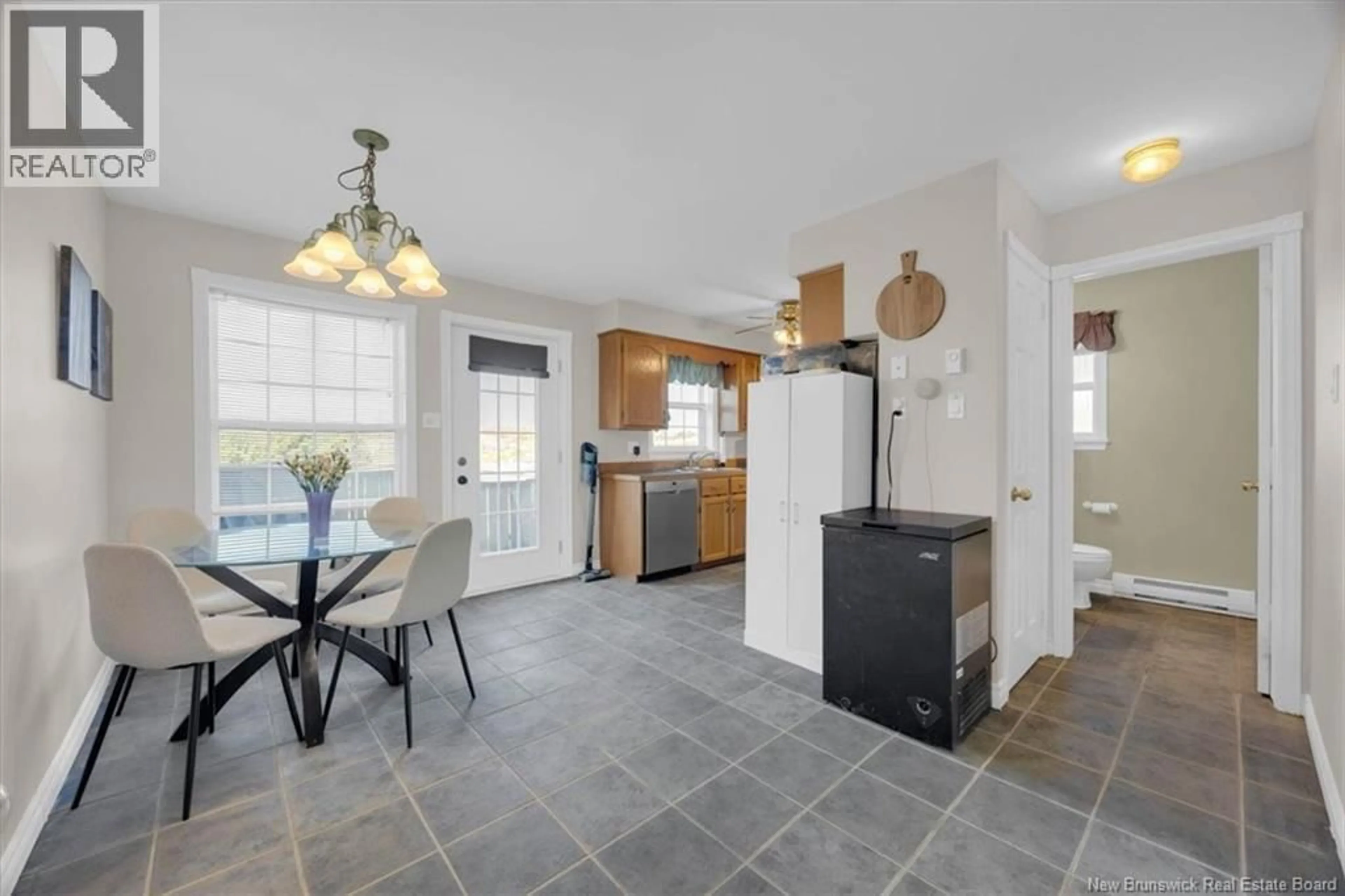 Open concept kitchen, ceramic/tile floor for 193 KING ST, Saint John New Brunswick E2M1S7