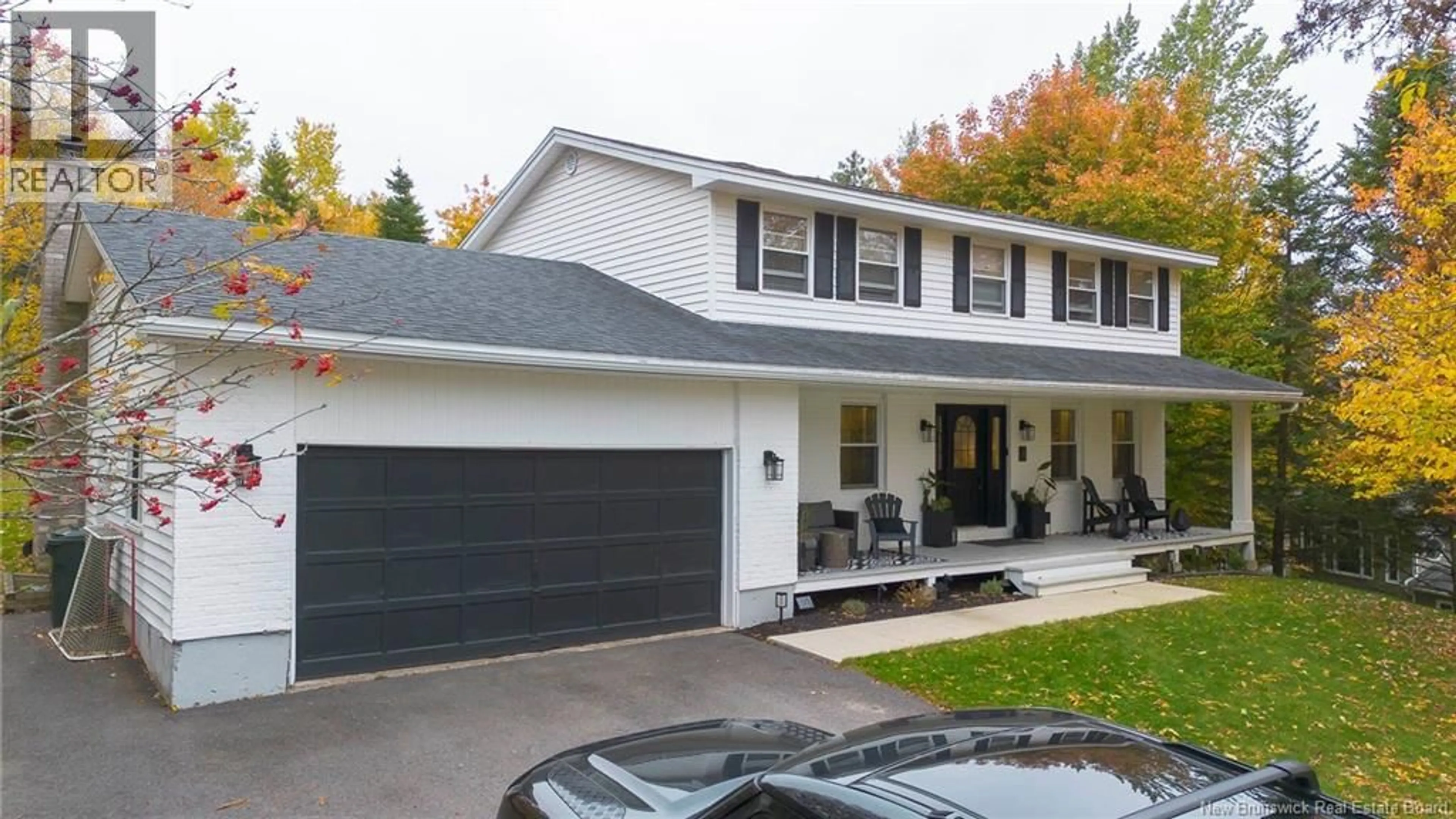 Home with vinyl exterior material, street for 4 WINDWOOD, Quispamsis New Brunswick E2E1S6