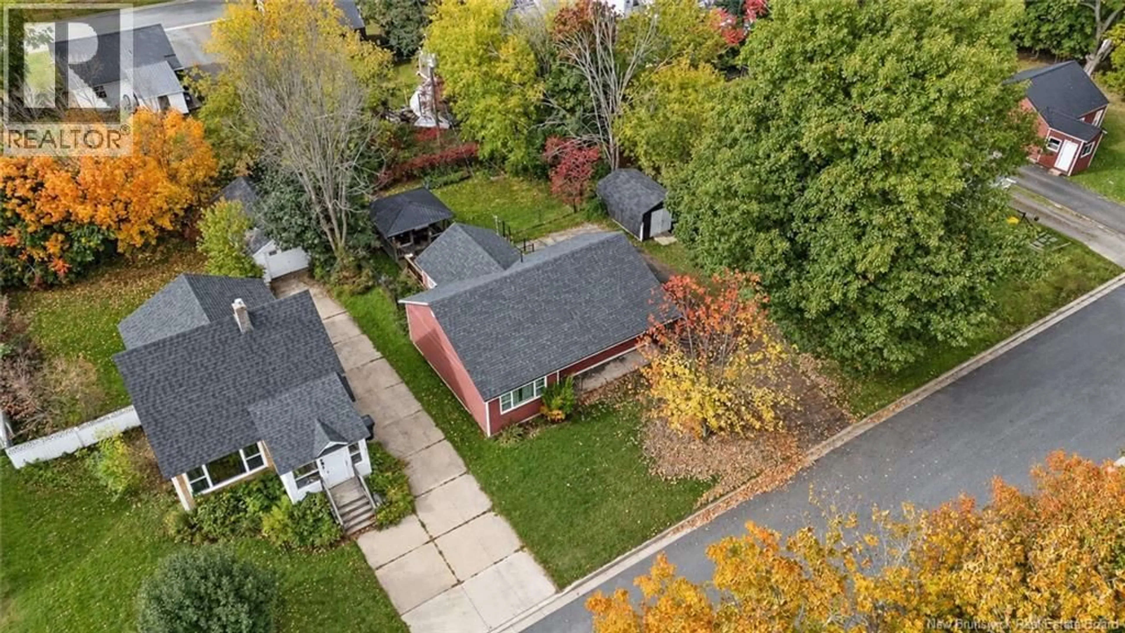 A pic from outside/outdoor area/front of a property/back of a property/a pic from drone, street for 660 PHILIP STREET, Fredericton New Brunswick E3A2Y4