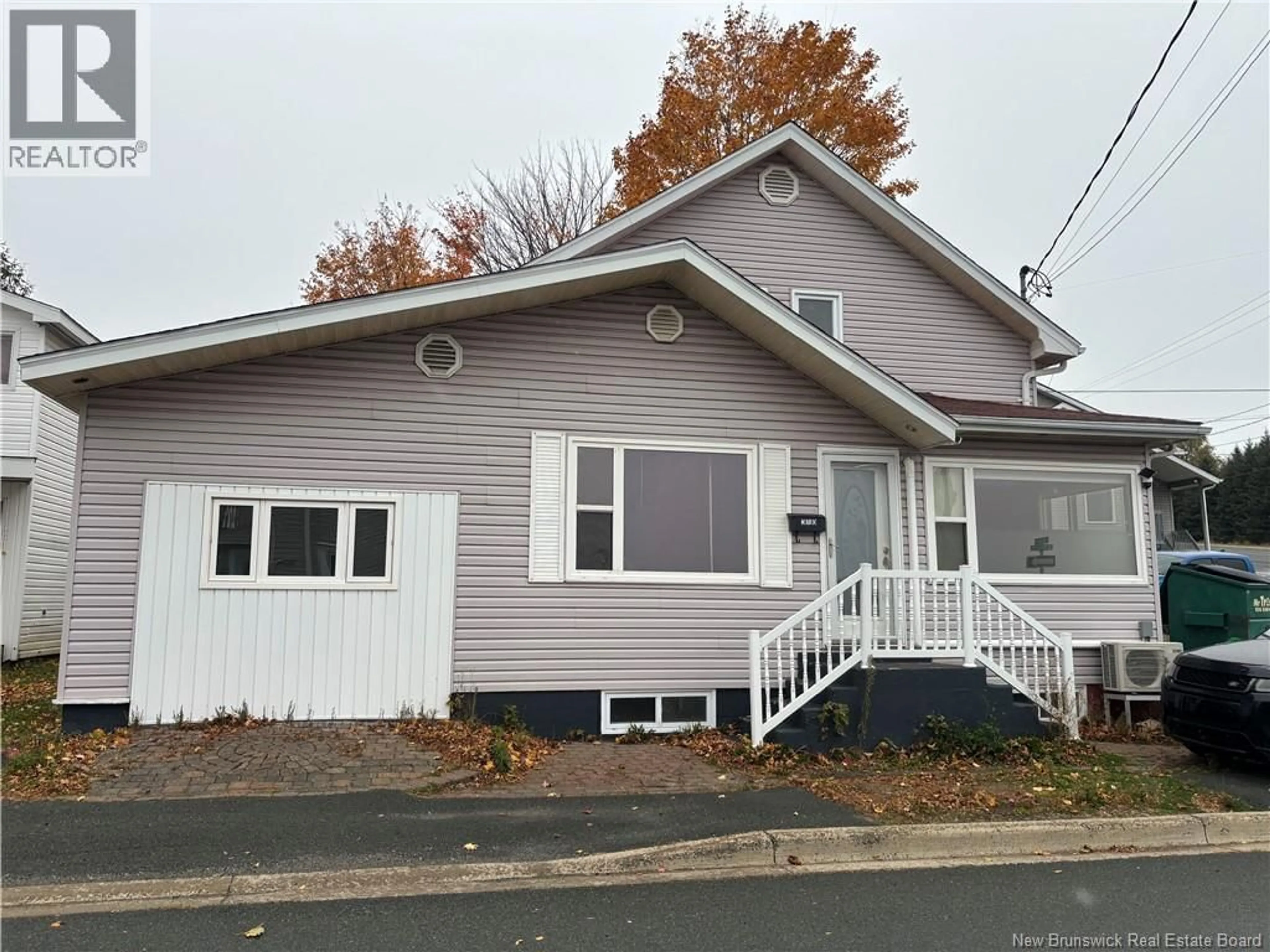 Home with vinyl exterior material, street for 310 RIVERSIDE DRIVE, Bathurst New Brunswick E2A2L9