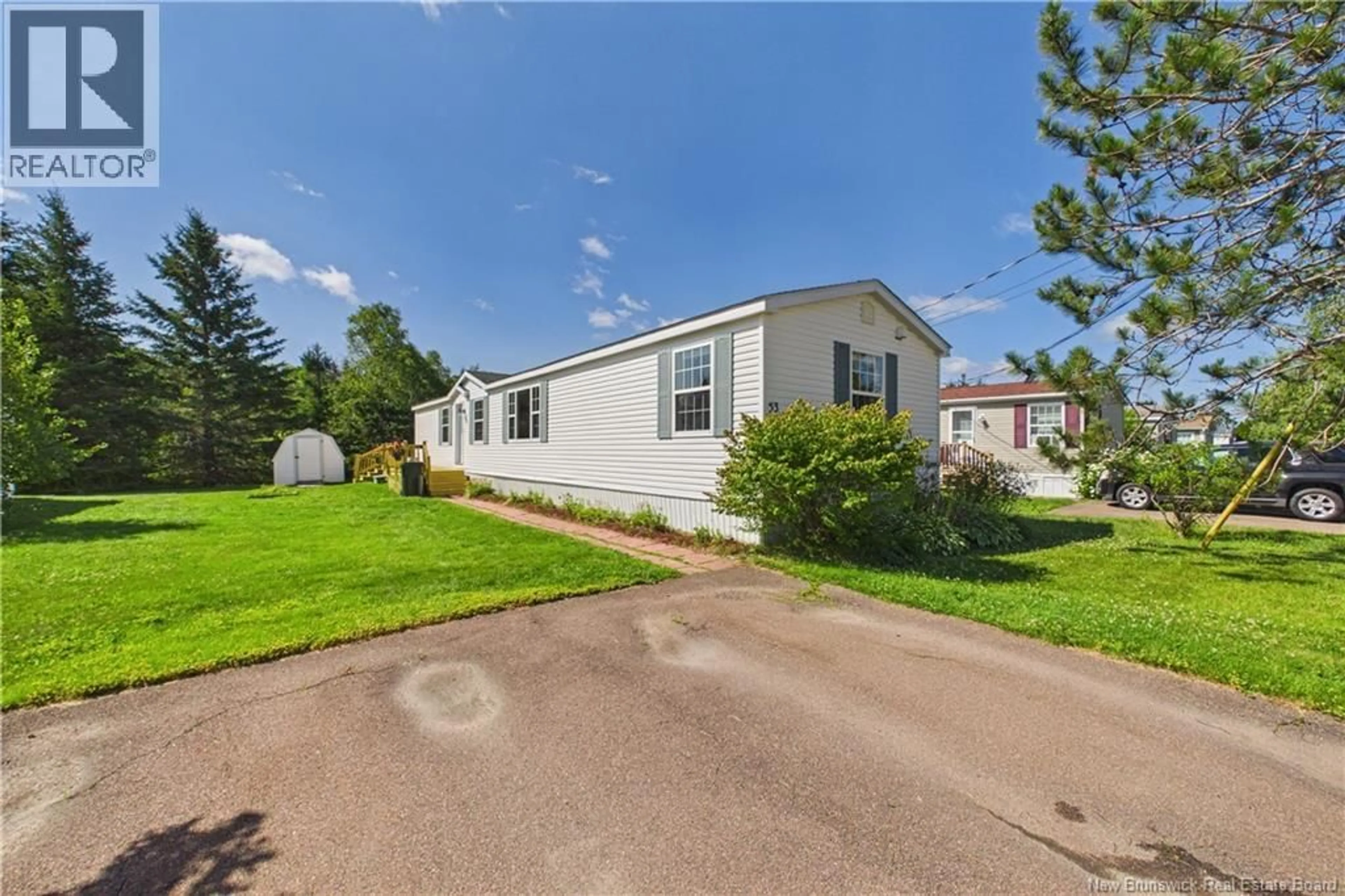 A pic from outside/outdoor area/front of a property/back of a property/a pic from drone, street for 53 ANDRE, Dieppe New Brunswick E1A7C4