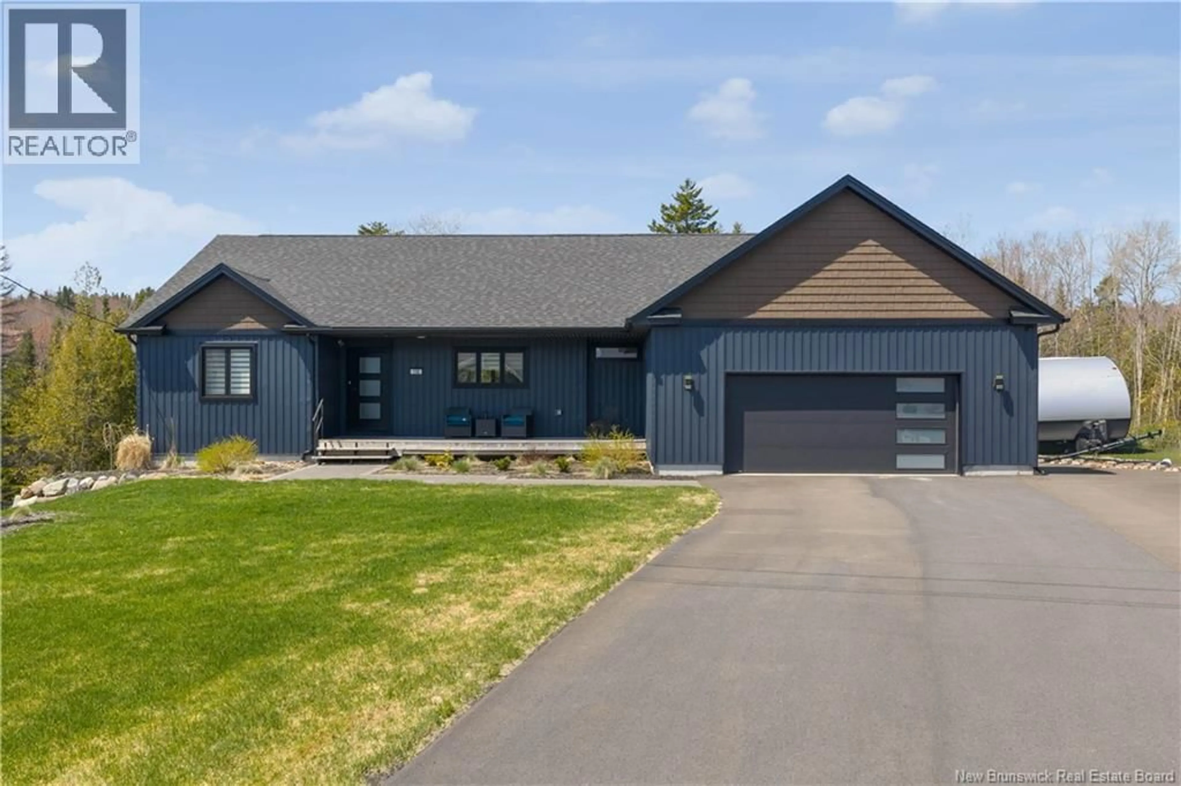Home with vinyl exterior material, street for 136 MONTANA DRIVE, Quispamsis New Brunswick E2E0W2