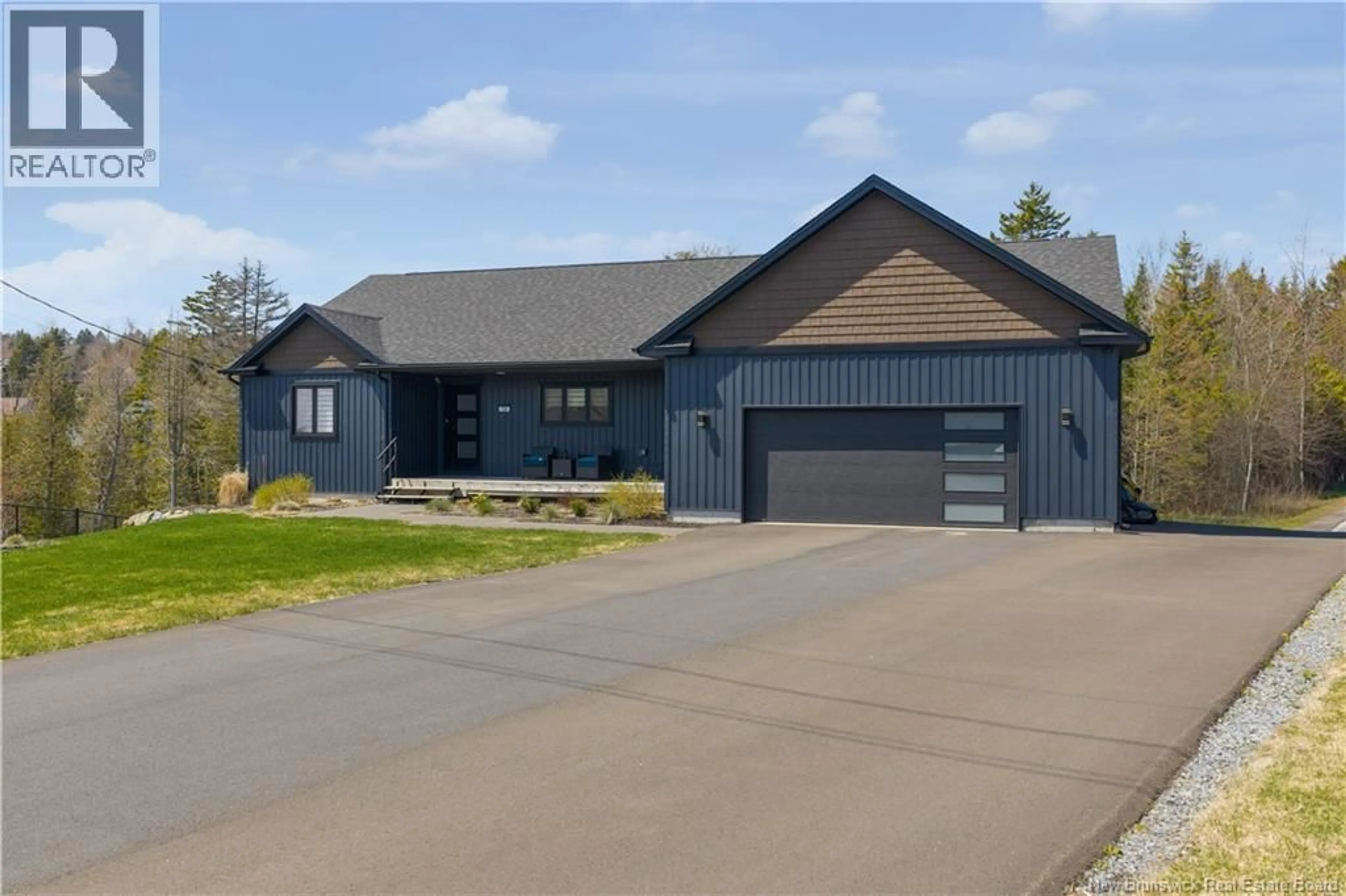 Home with vinyl exterior material, street for 136 MONTANA DRIVE, Quispamsis New Brunswick E2E0W2