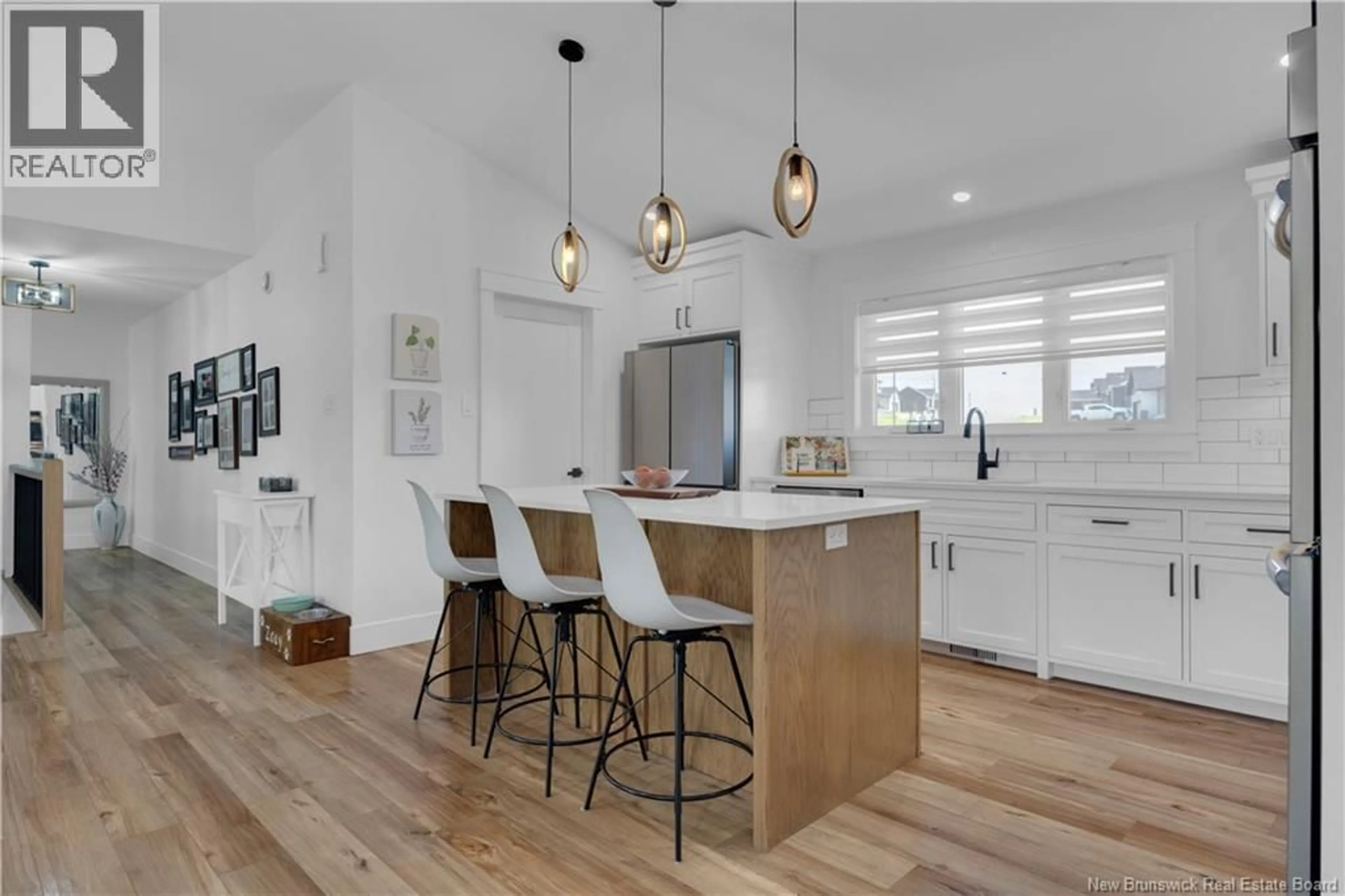 Open concept kitchen, wood/laminate floor for 136 MONTANA DRIVE, Quispamsis New Brunswick E2E0W2
