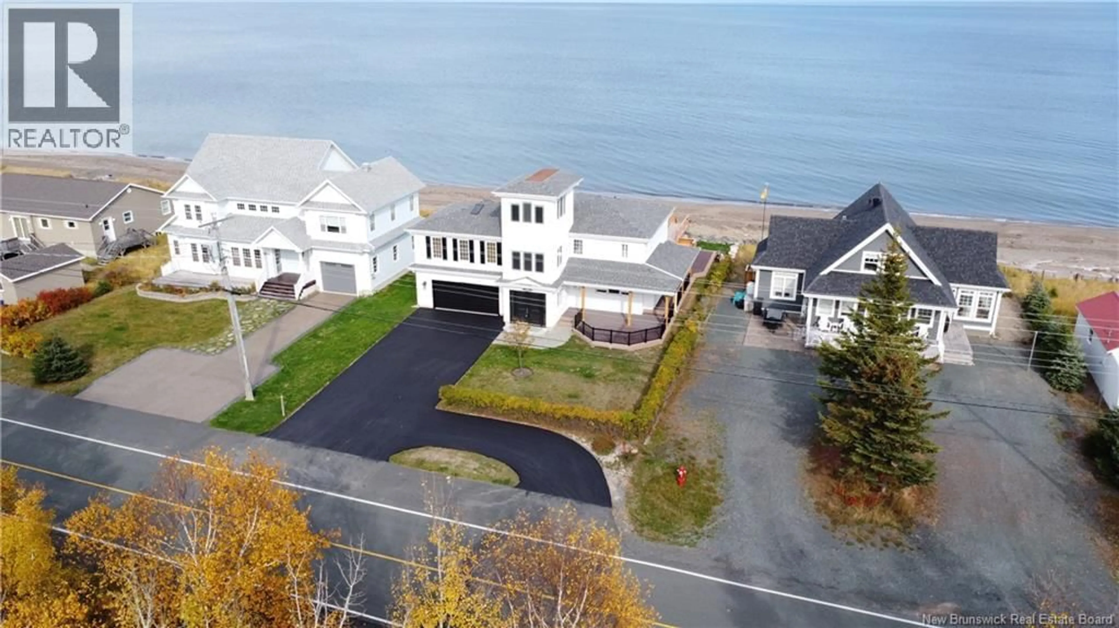 A pic from outside/outdoor area/front of a property/back of a property/a pic from drone, water/lake/river/ocean view for 2156 QUEEN ELIZABETH DRIVE, Bathurst New Brunswick E2A4Y4