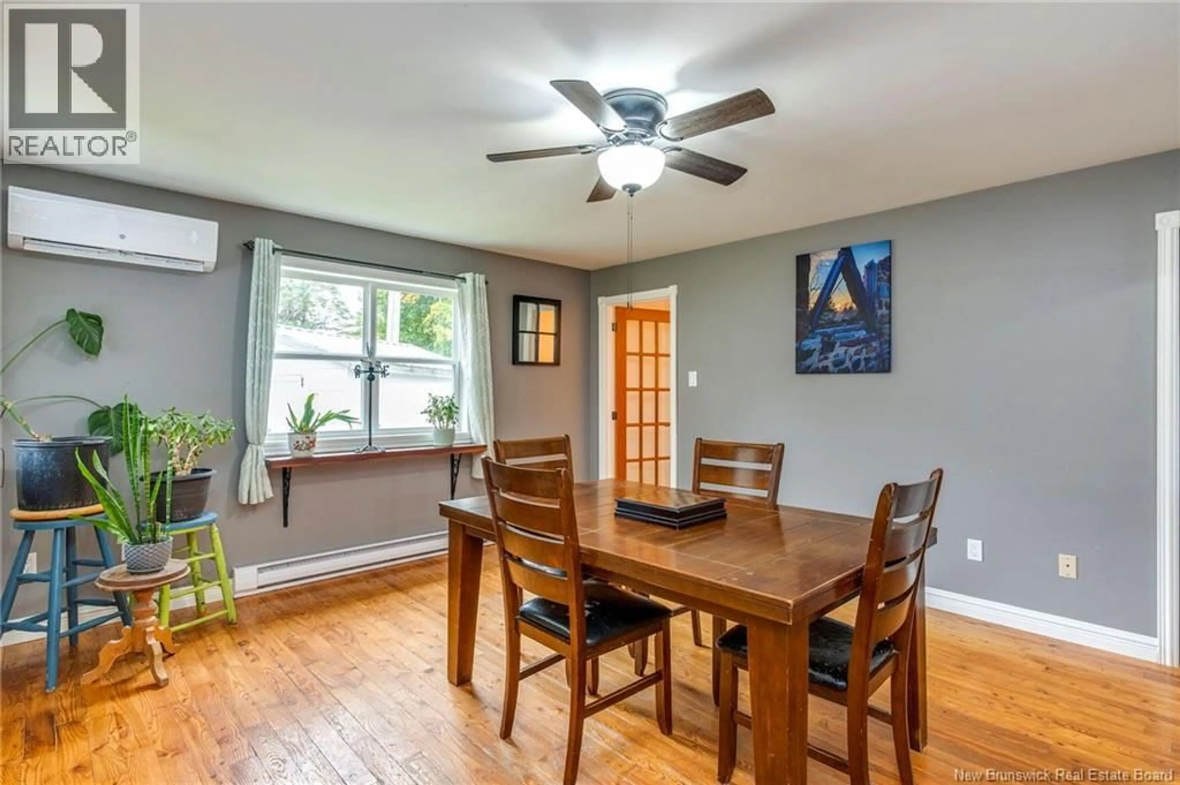 Dining room, wood/laminate floor for 64 NECK ROAD, Quispamsis New Brunswick E2G1J5