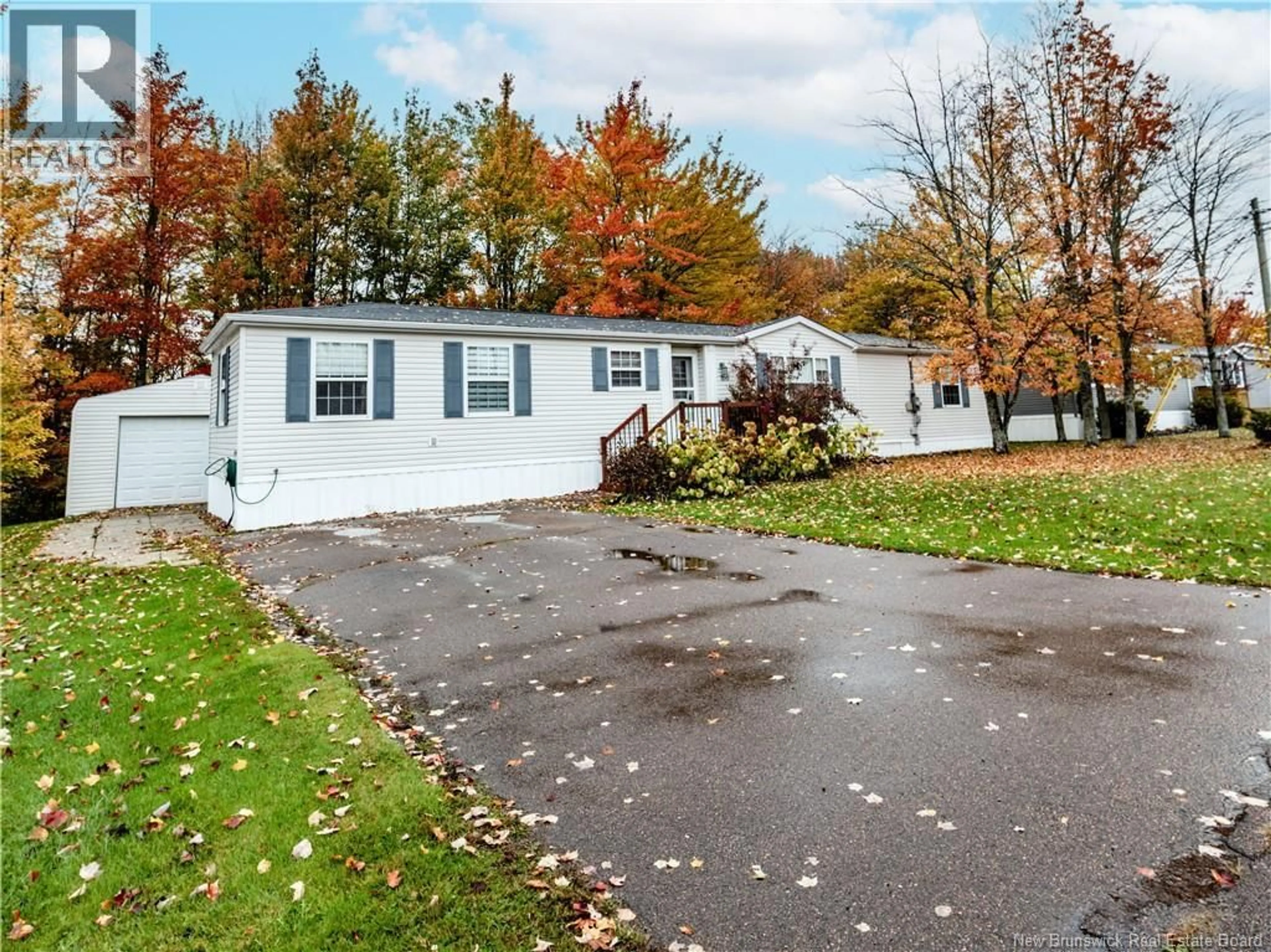 Home with vinyl exterior material, street for 166 NEPISIGUIT, Dieppe New Brunswick E1A7N1