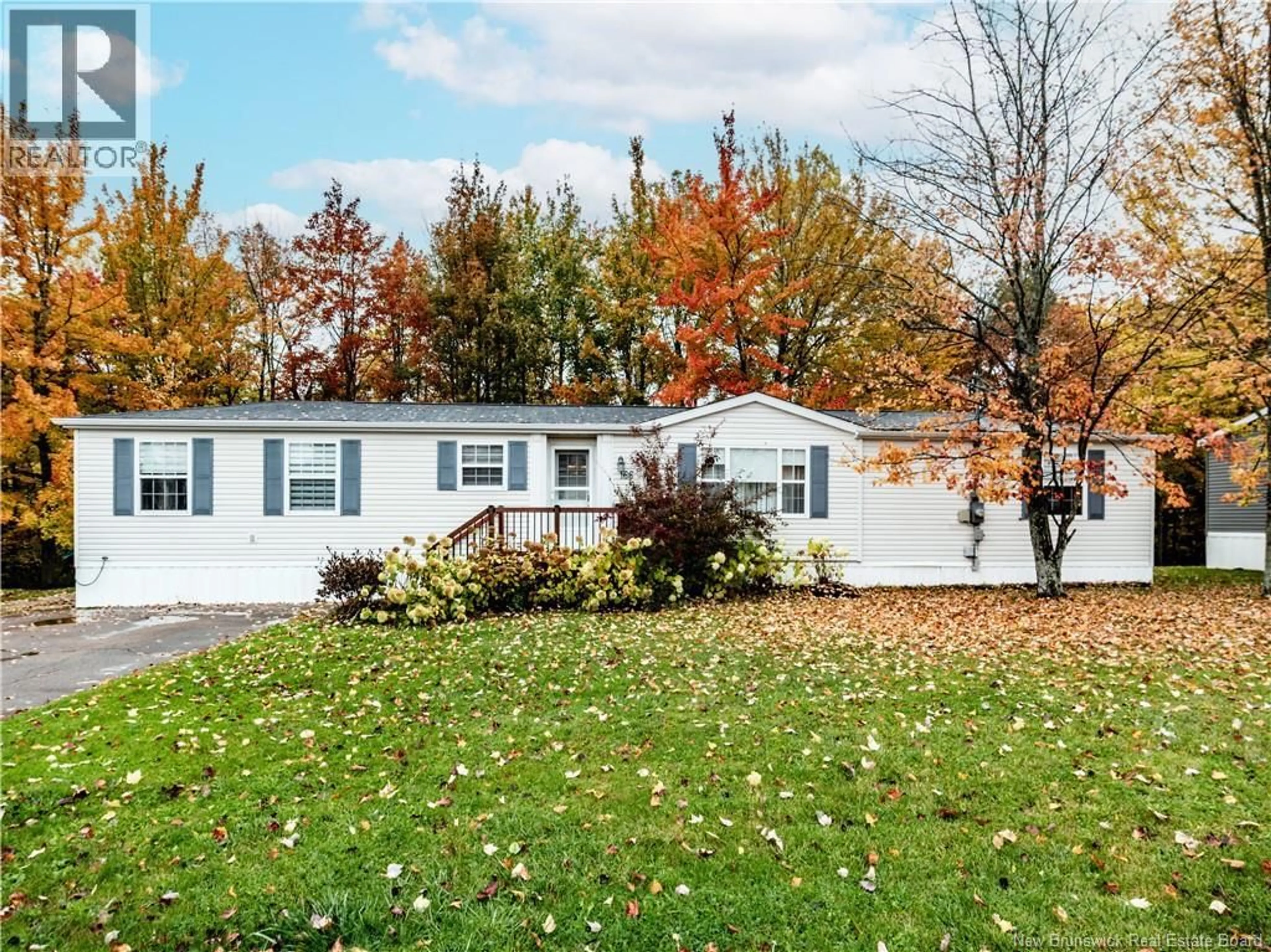 Home with vinyl exterior material, street for 166 NEPISIGUIT, Dieppe New Brunswick E1A7N1