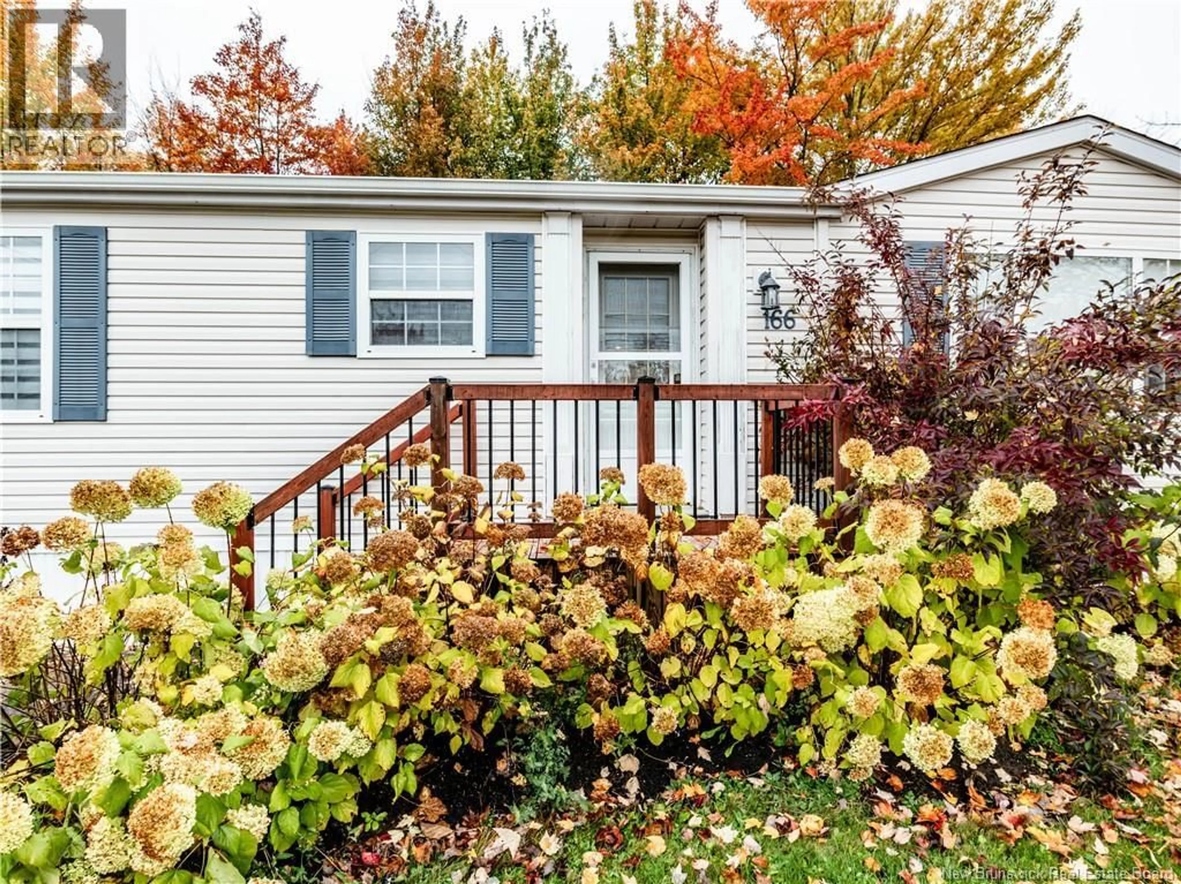 Home with vinyl exterior material, street for 166 NEPISIGUIT, Dieppe New Brunswick E1A7N1