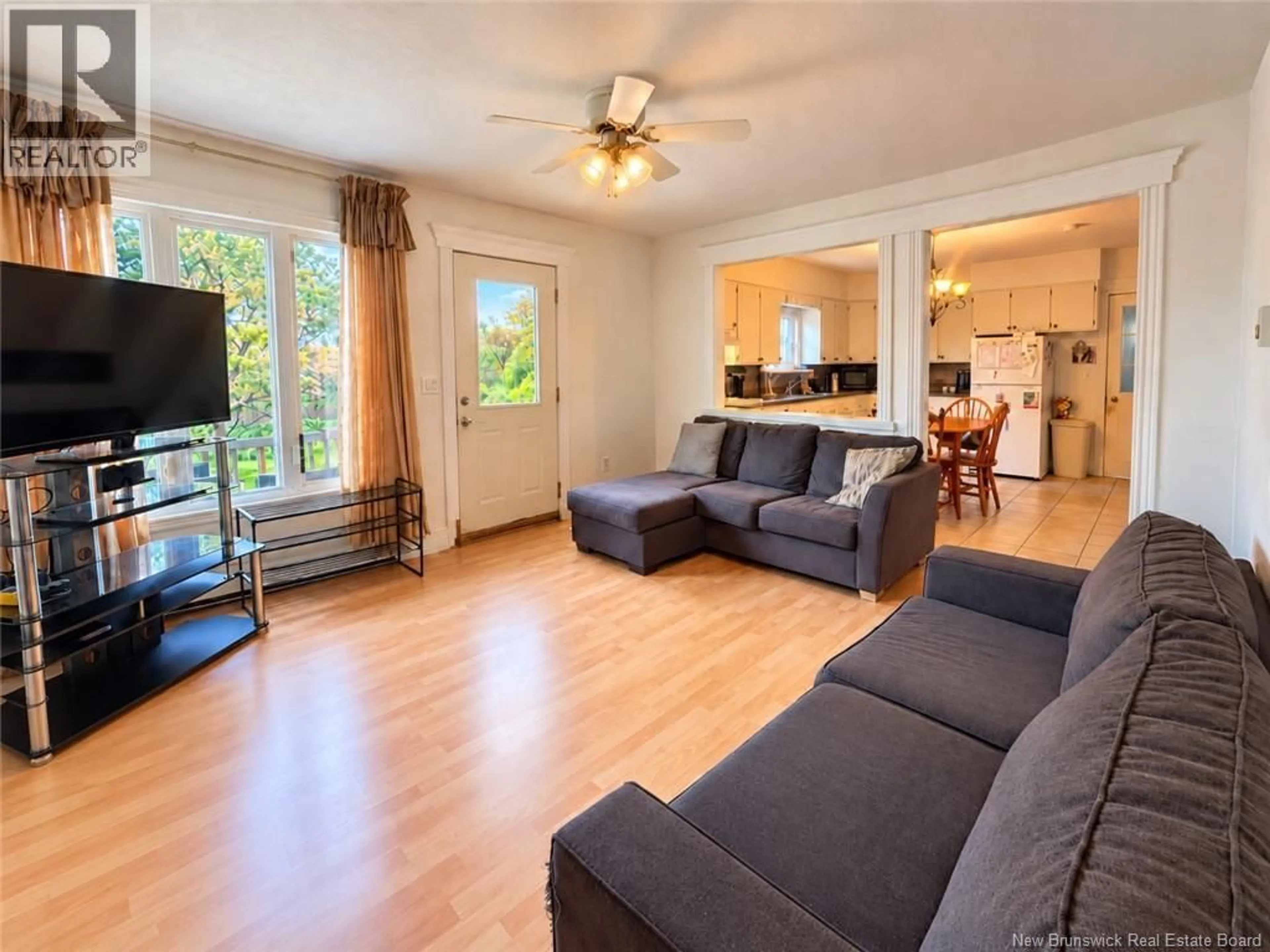 Living room with furniture, wood/laminate floor for 1787 ROUTE 950, Trois Ruisseaux New Brunswick E4N2Y9