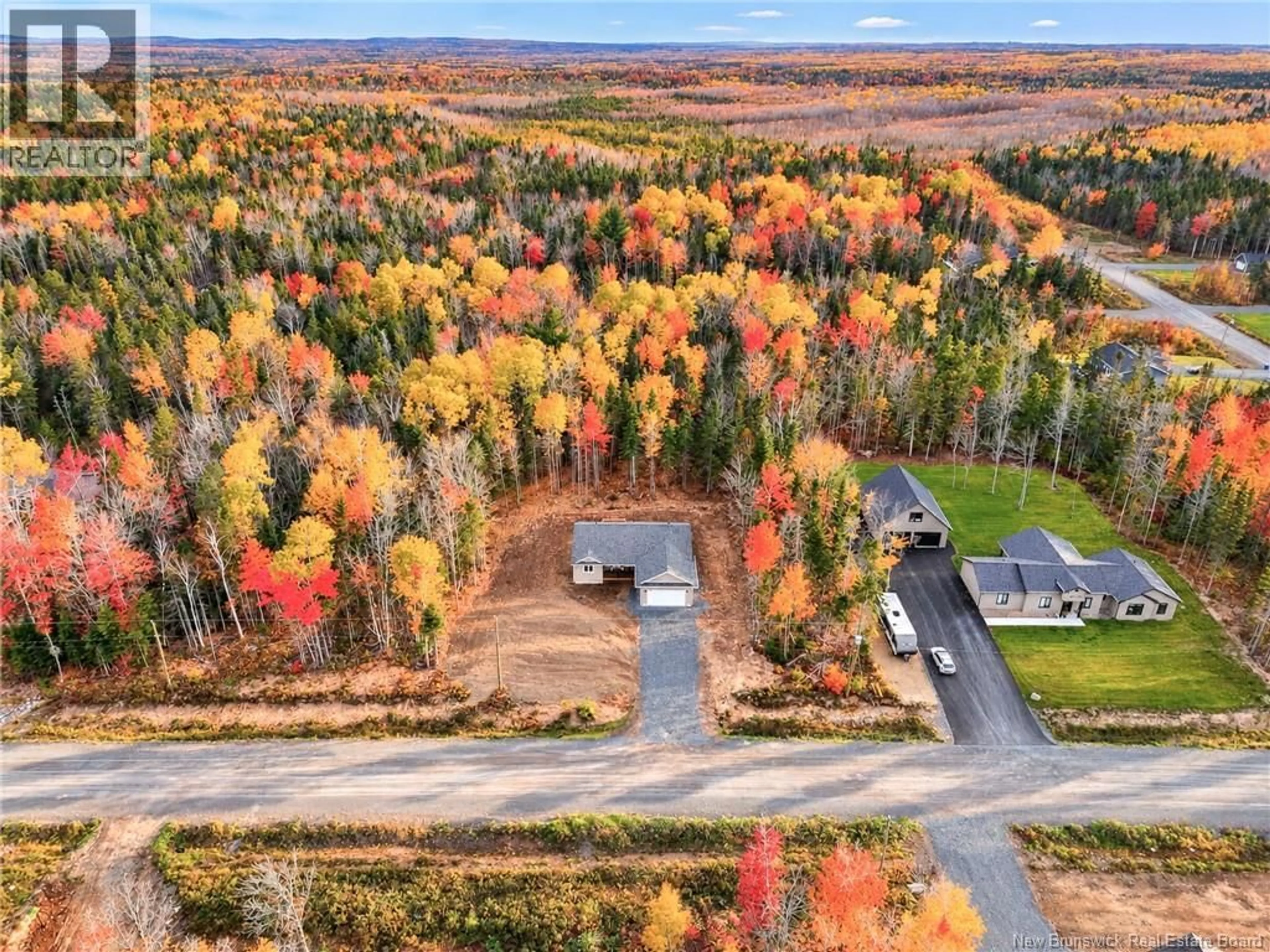 A pic from outside/outdoor area/front of a property/back of a property/a pic from drone, forest/trees view for 12 ANDELYSE DRIVE, Rusagonis New Brunswick E3B1R9
