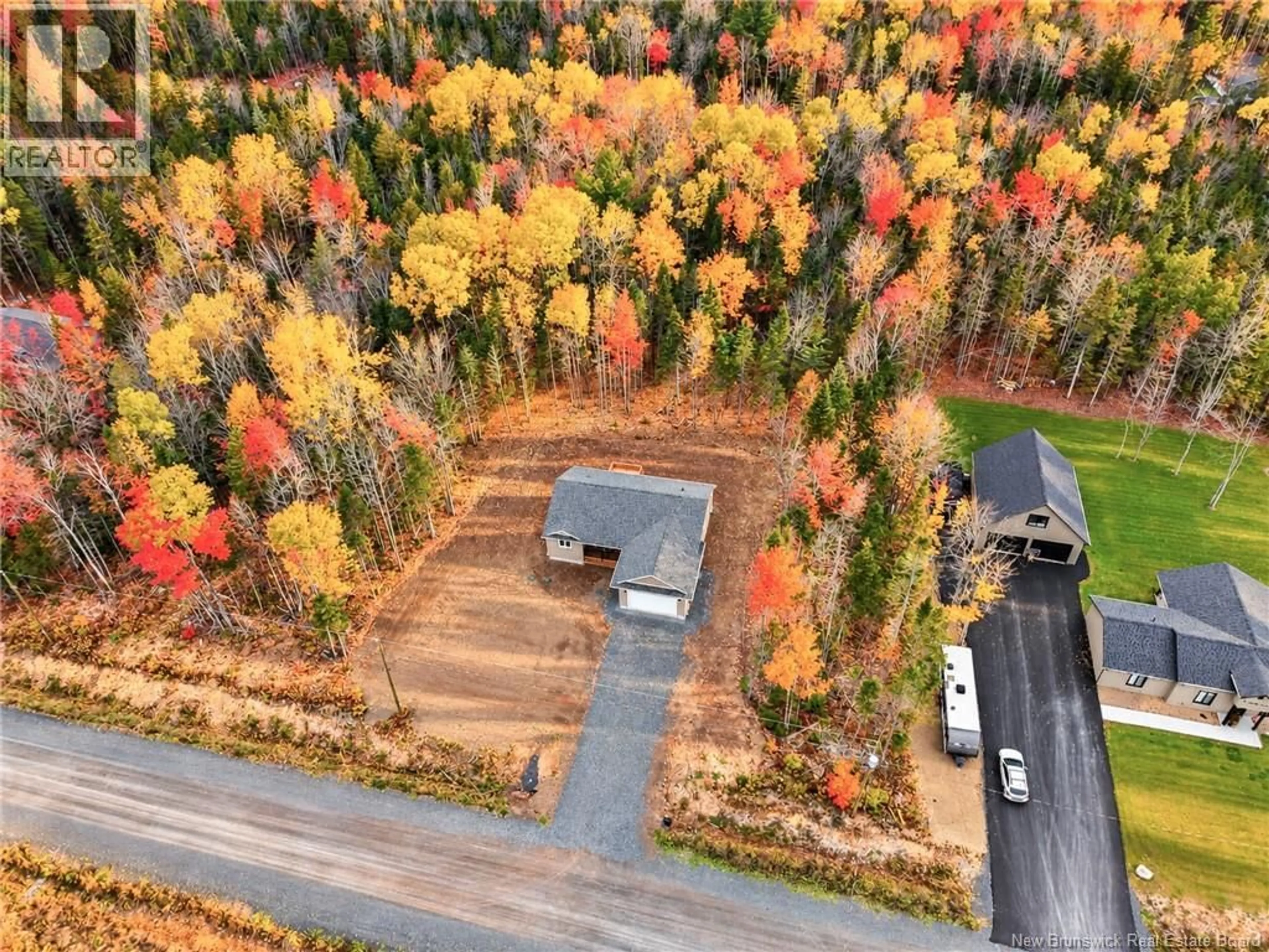 A pic from outside/outdoor area/front of a property/back of a property/a pic from drone, forest/trees view for 12 ANDELYSE DRIVE, Rusagonis New Brunswick E3B1R9