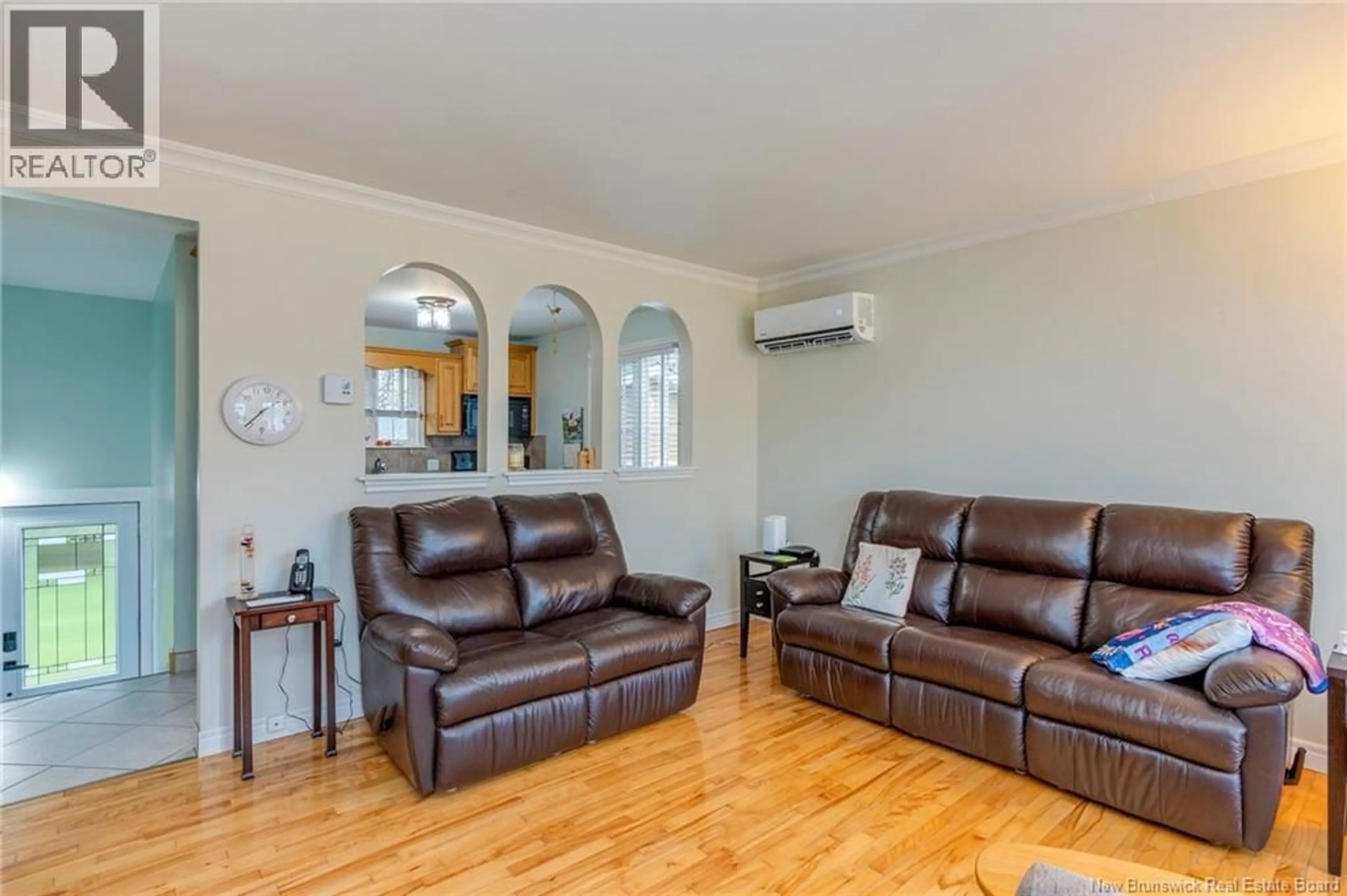 Living room with furniture, wood/laminate floor for 20 MELANSON ROAD, Cap-Pelé New Brunswick E4N1X4