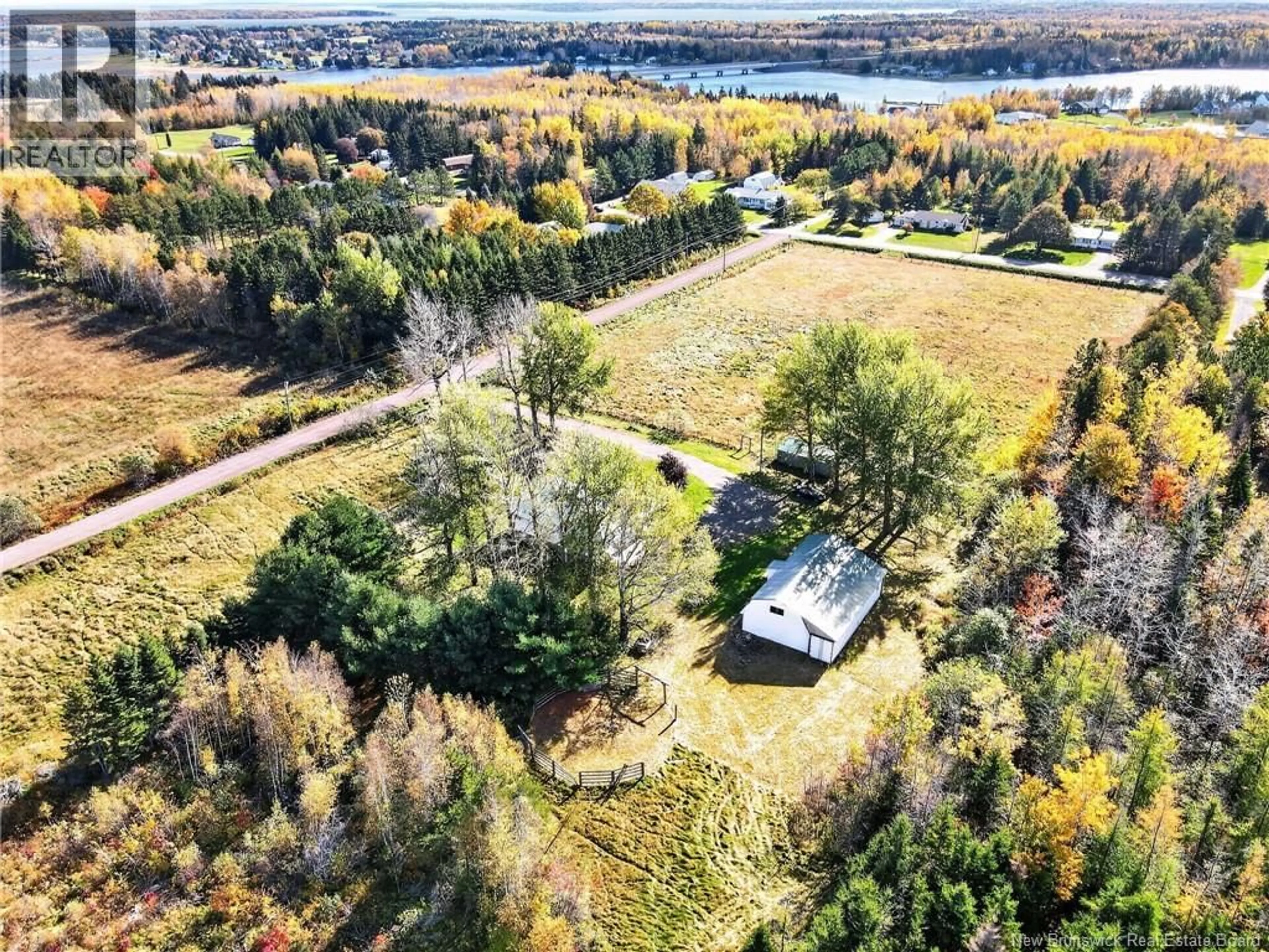 A pic from outside/outdoor area/front of a property/back of a property/a pic from drone, water/lake/river/ocean view for 18 JEAN MAILLET ROAD, Shediac River New Brunswick E4R1L2