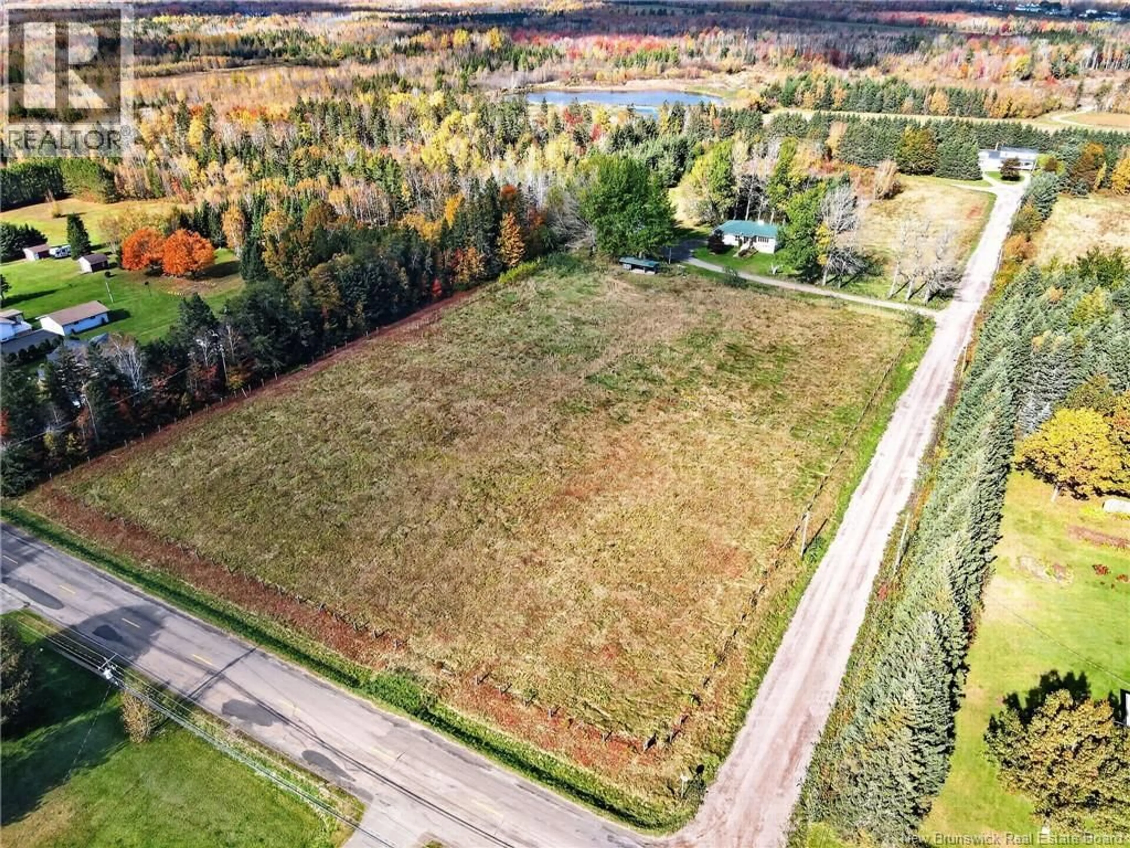 A pic from outside/outdoor area/front of a property/back of a property/a pic from drone, unknown for 18 JEAN MAILLET ROAD, Shediac River New Brunswick E4R1L2