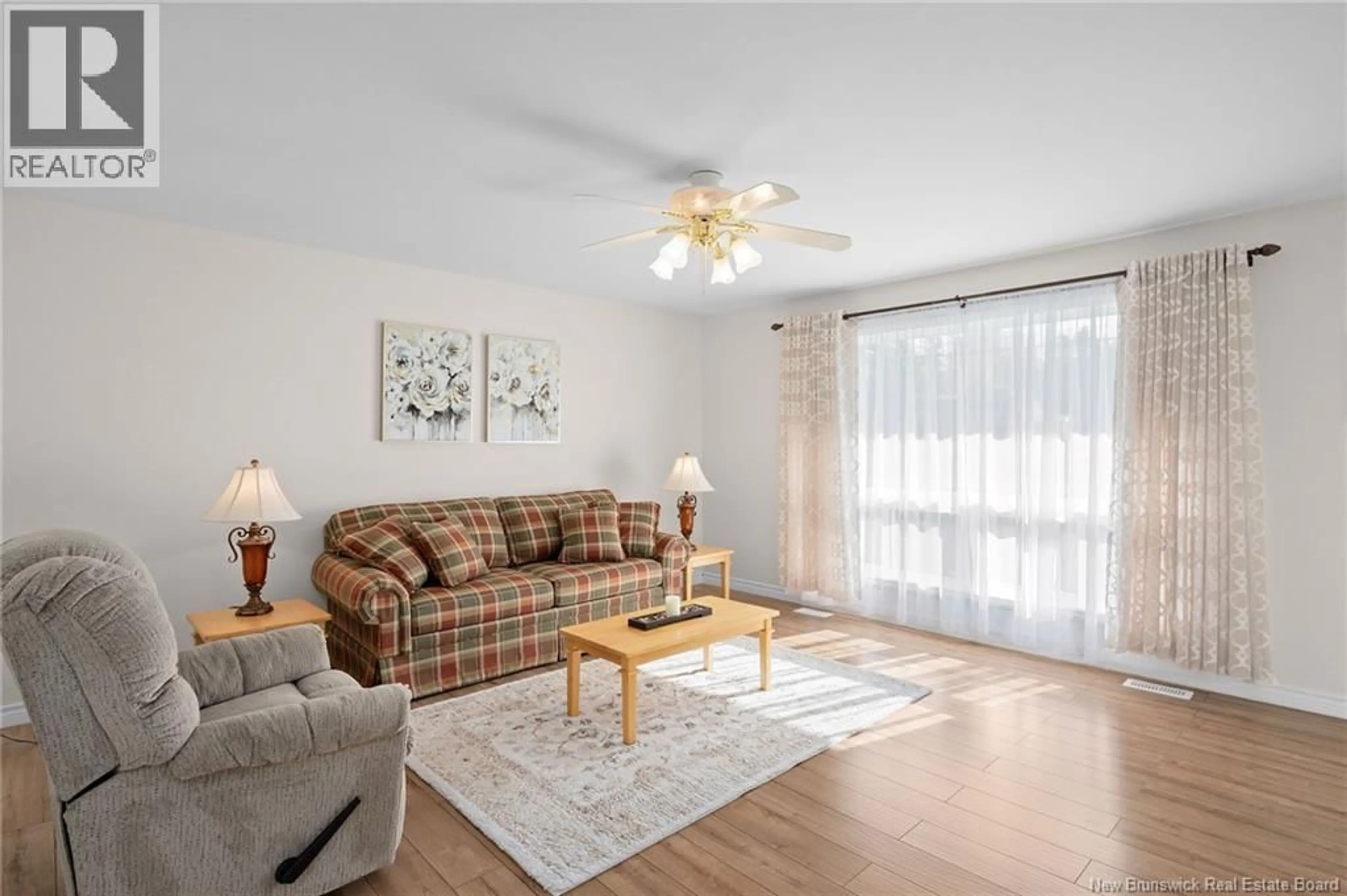 Living room with furniture, wood/laminate floor for 2069 ROUTE 112, Upper Coverdale New Brunswick E1J1Z5