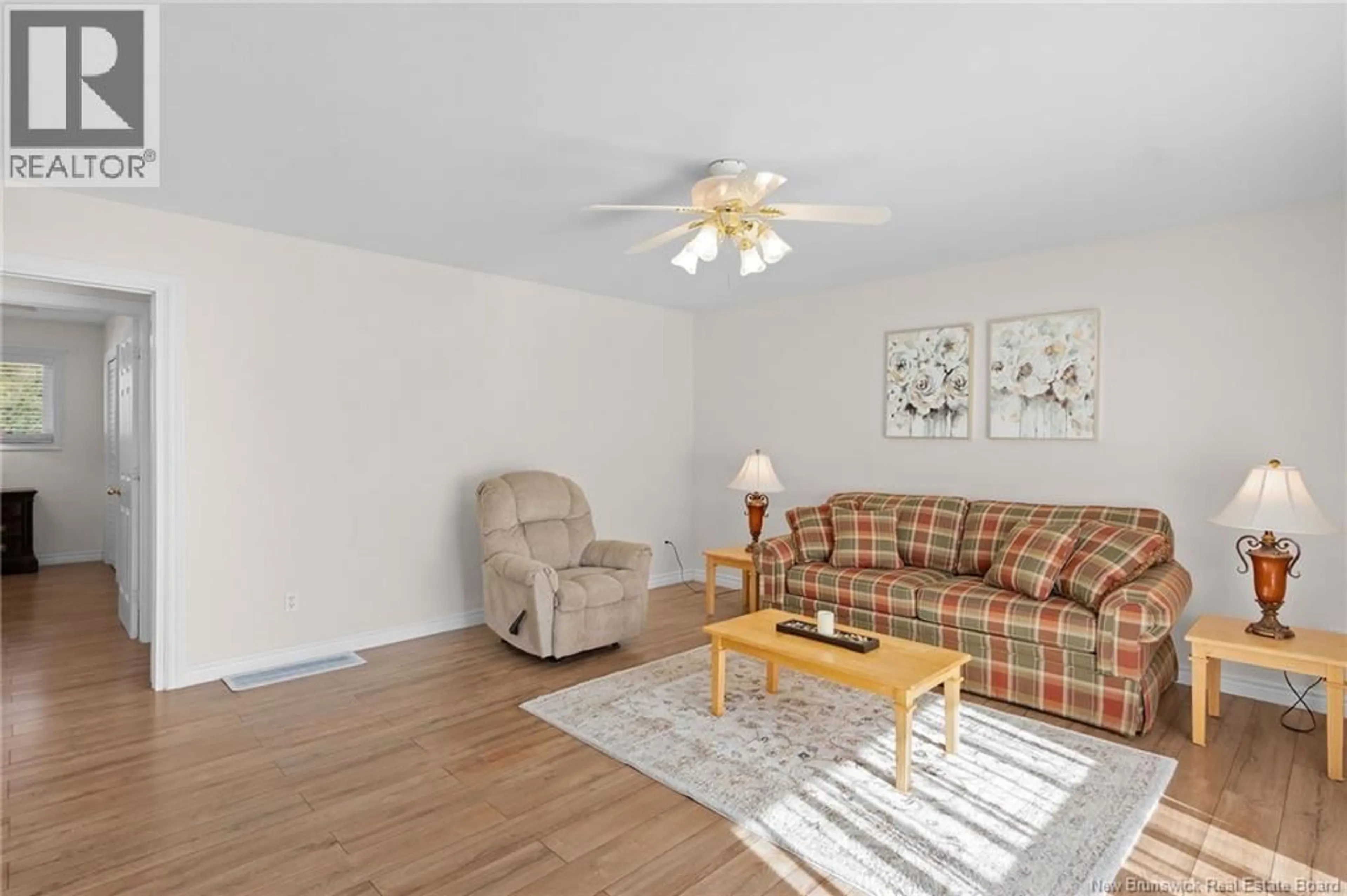 Living room with furniture, wood/laminate floor for 2069 ROUTE 112, Upper Coverdale New Brunswick E1J1Z5