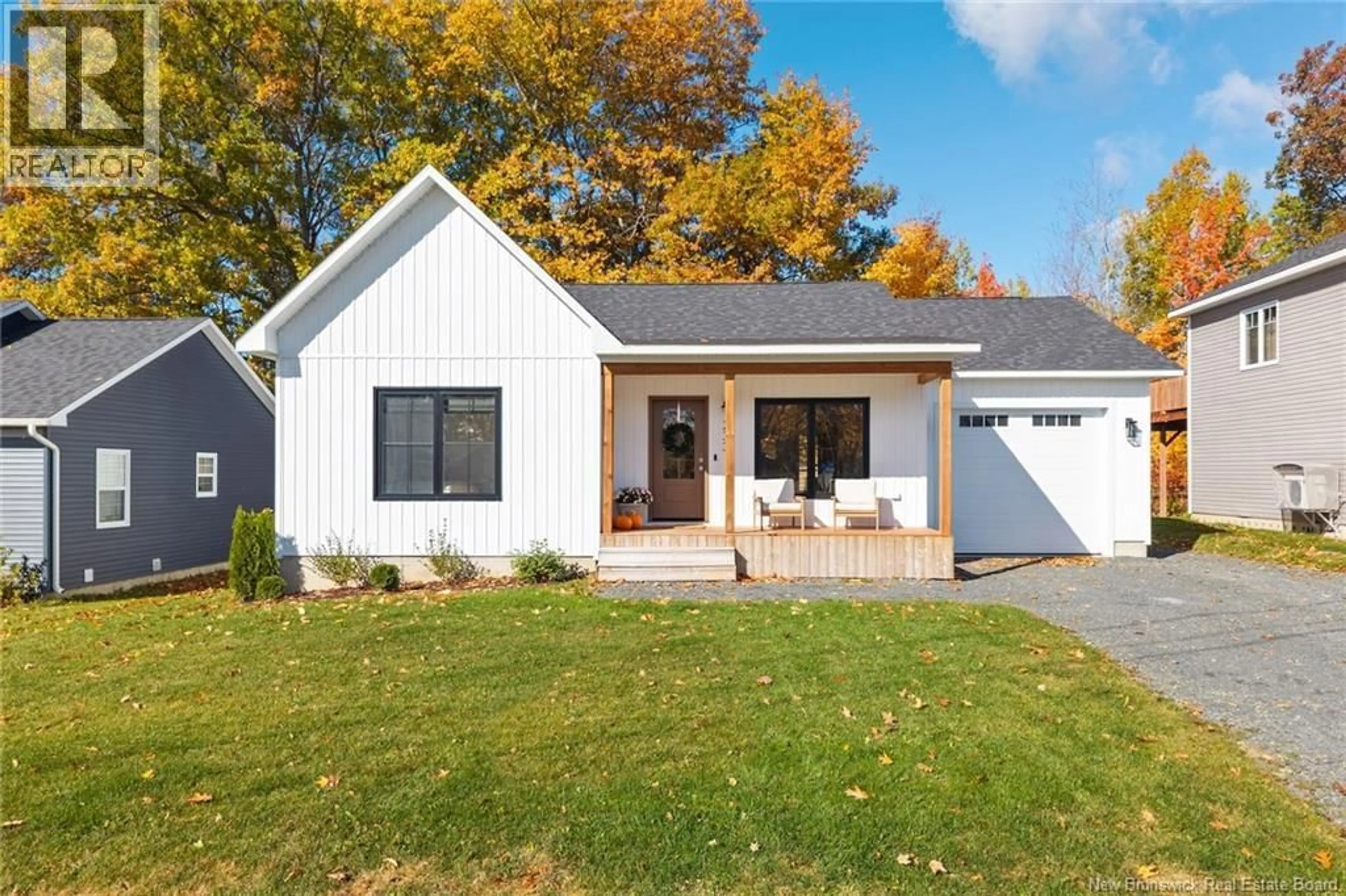 Home with vinyl exterior material, street for 233 GILRIDGE DRIVE, Fredericton New Brunswick E3G0A2