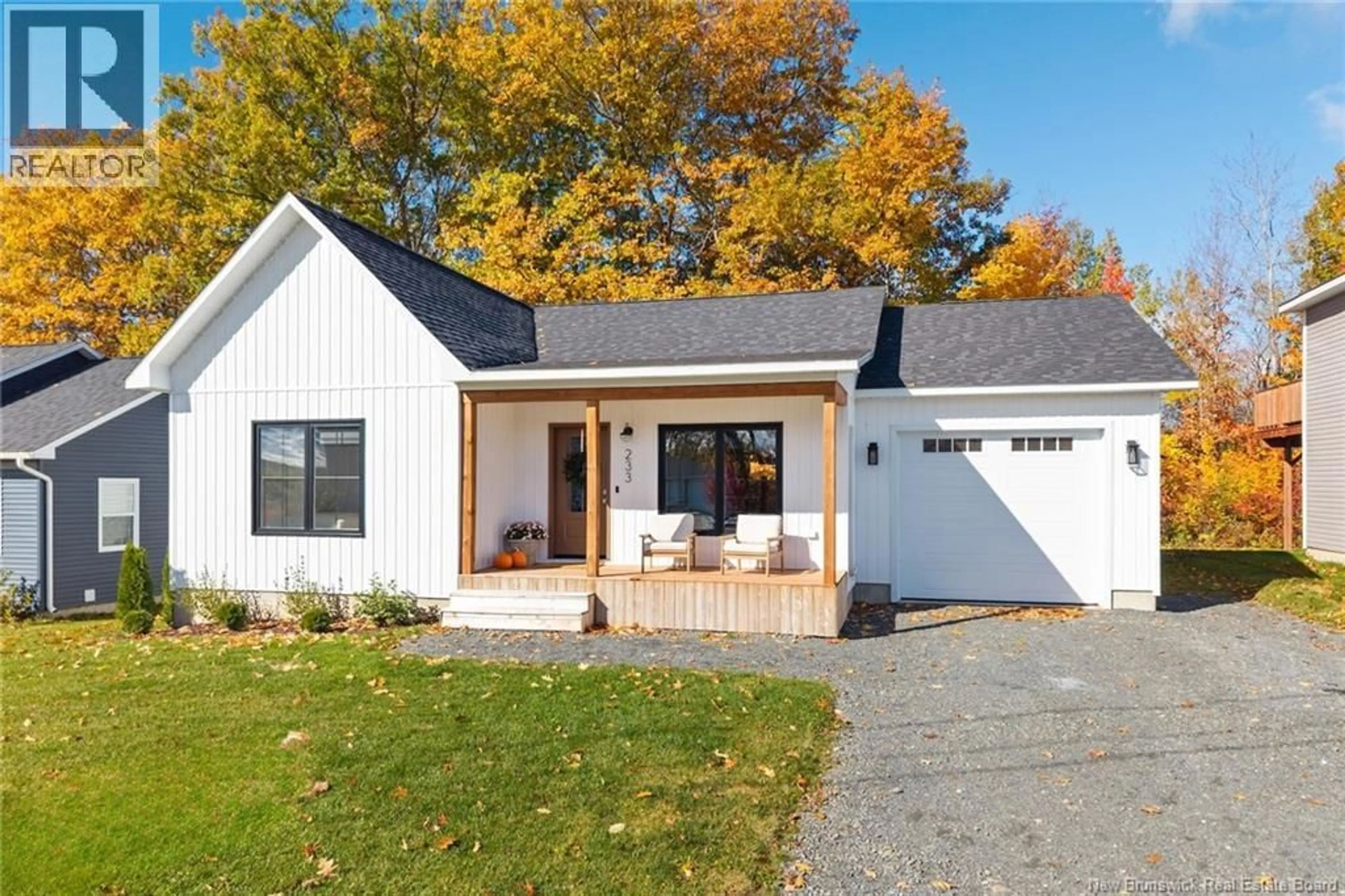 Home with vinyl exterior material, street for 233 GILRIDGE DRIVE, Fredericton New Brunswick E3G0A2