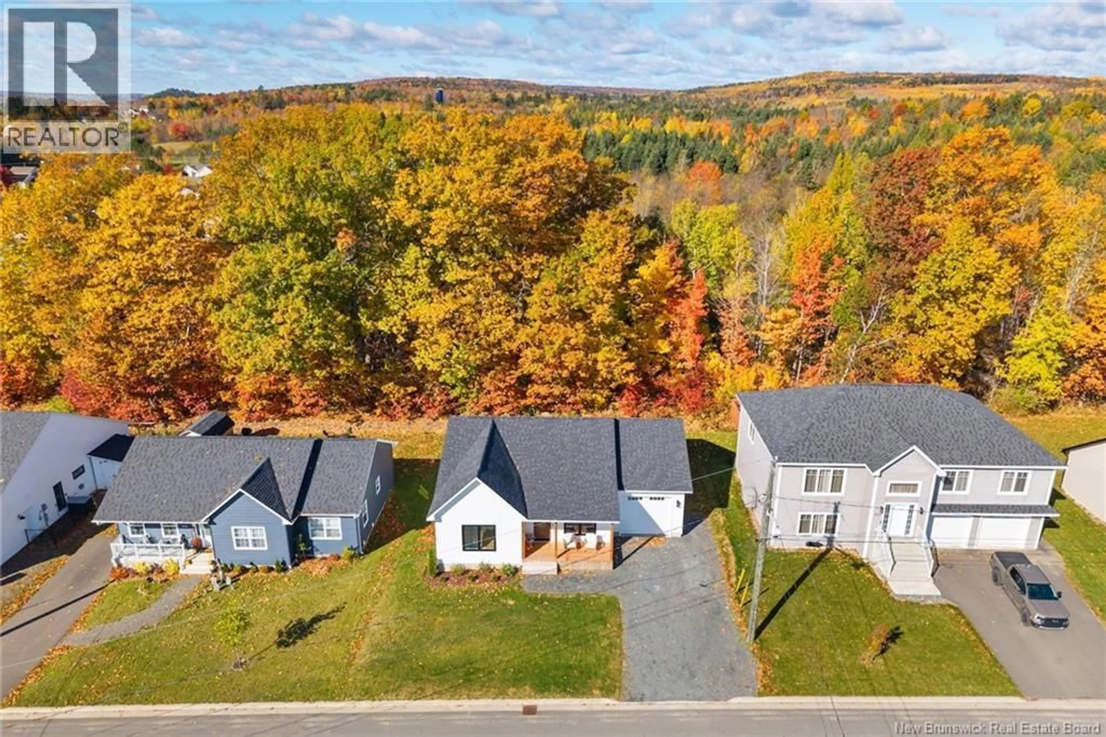 A pic from outside/outdoor area/front of a property/back of a property/a pic from drone, street for 233 GILRIDGE DRIVE, Fredericton New Brunswick E3G0A2