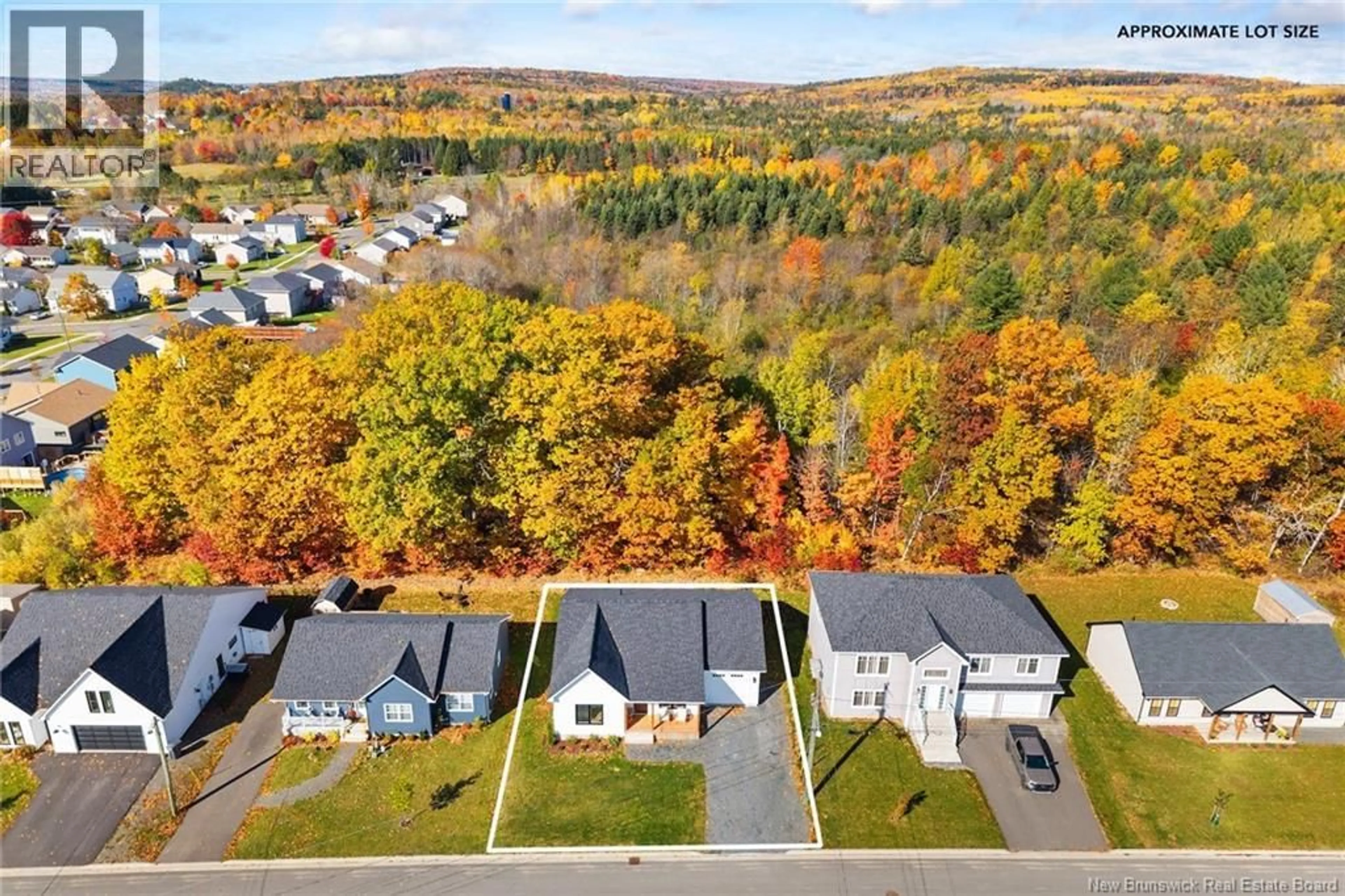 A pic from outside/outdoor area/front of a property/back of a property/a pic from drone, unknown for 233 GILRIDGE DRIVE, Fredericton New Brunswick E3G0A2