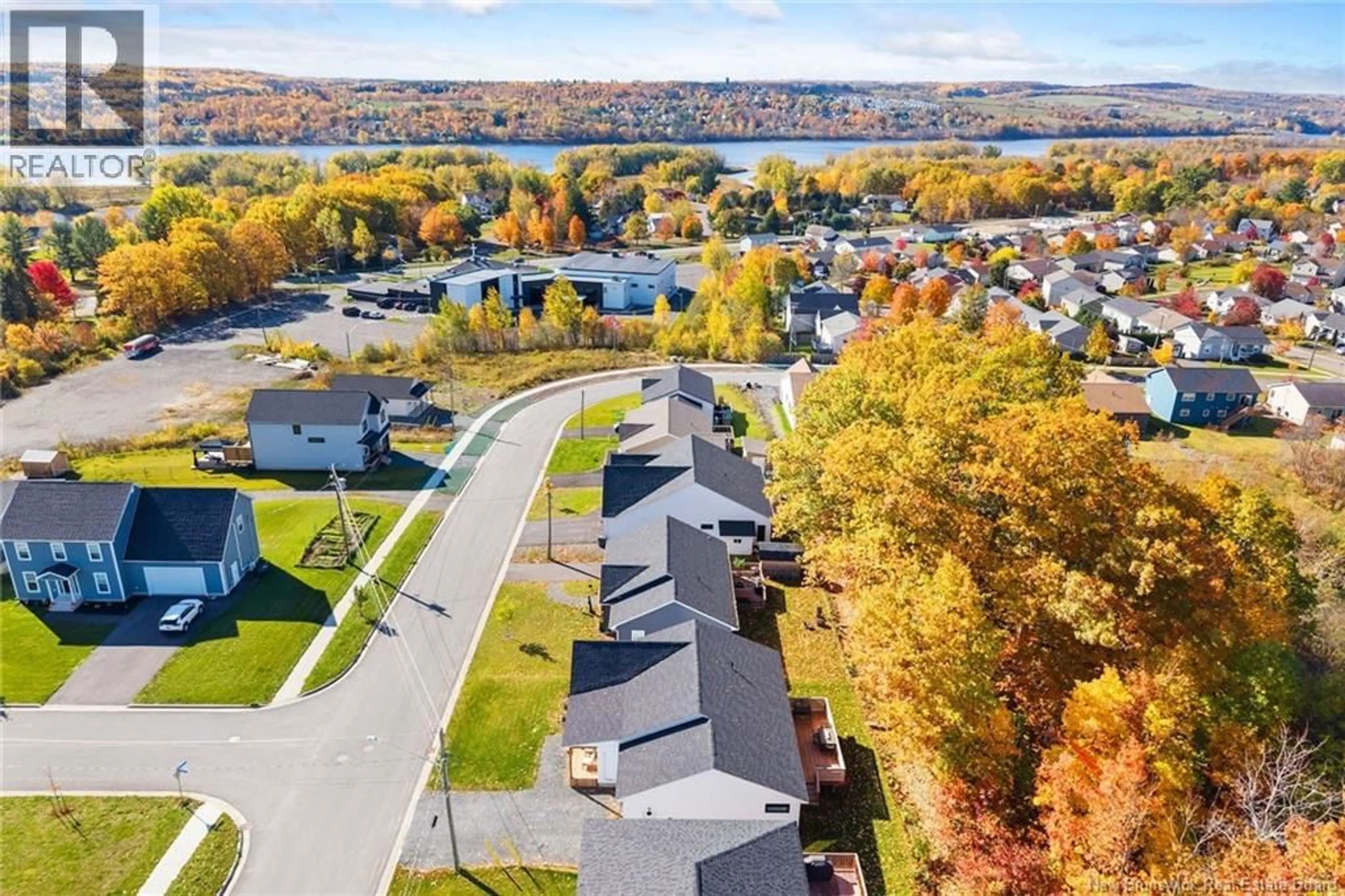 A pic from outside/outdoor area/front of a property/back of a property/a pic from drone, water/lake/river/ocean view for 233 GILRIDGE DRIVE, Fredericton New Brunswick E3G0A2