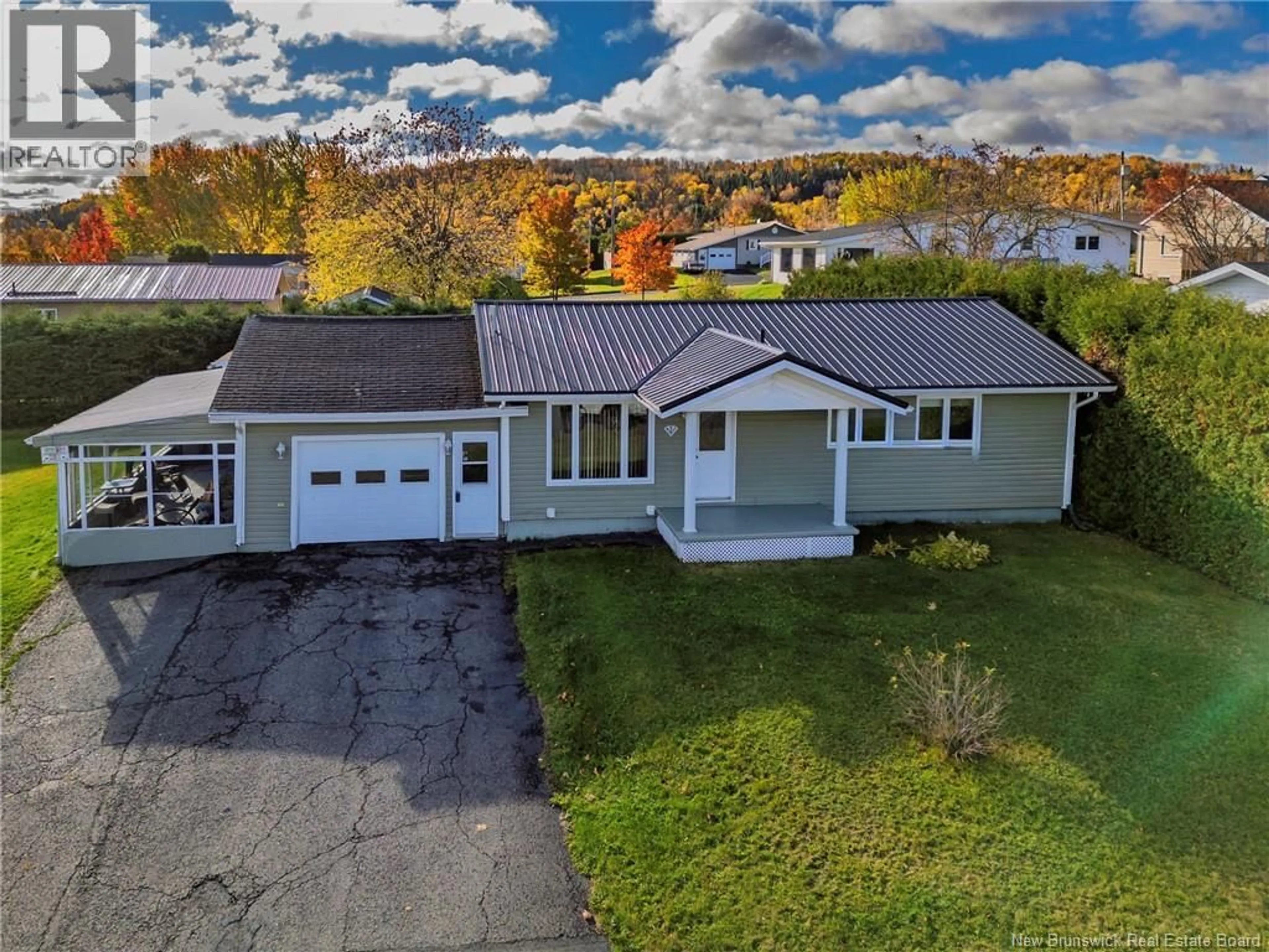 A pic from outside/outdoor area/front of a property/back of a property/a pic from drone, street for 605 5TH AVE, Grand Falls New Brunswick E3Z1A1