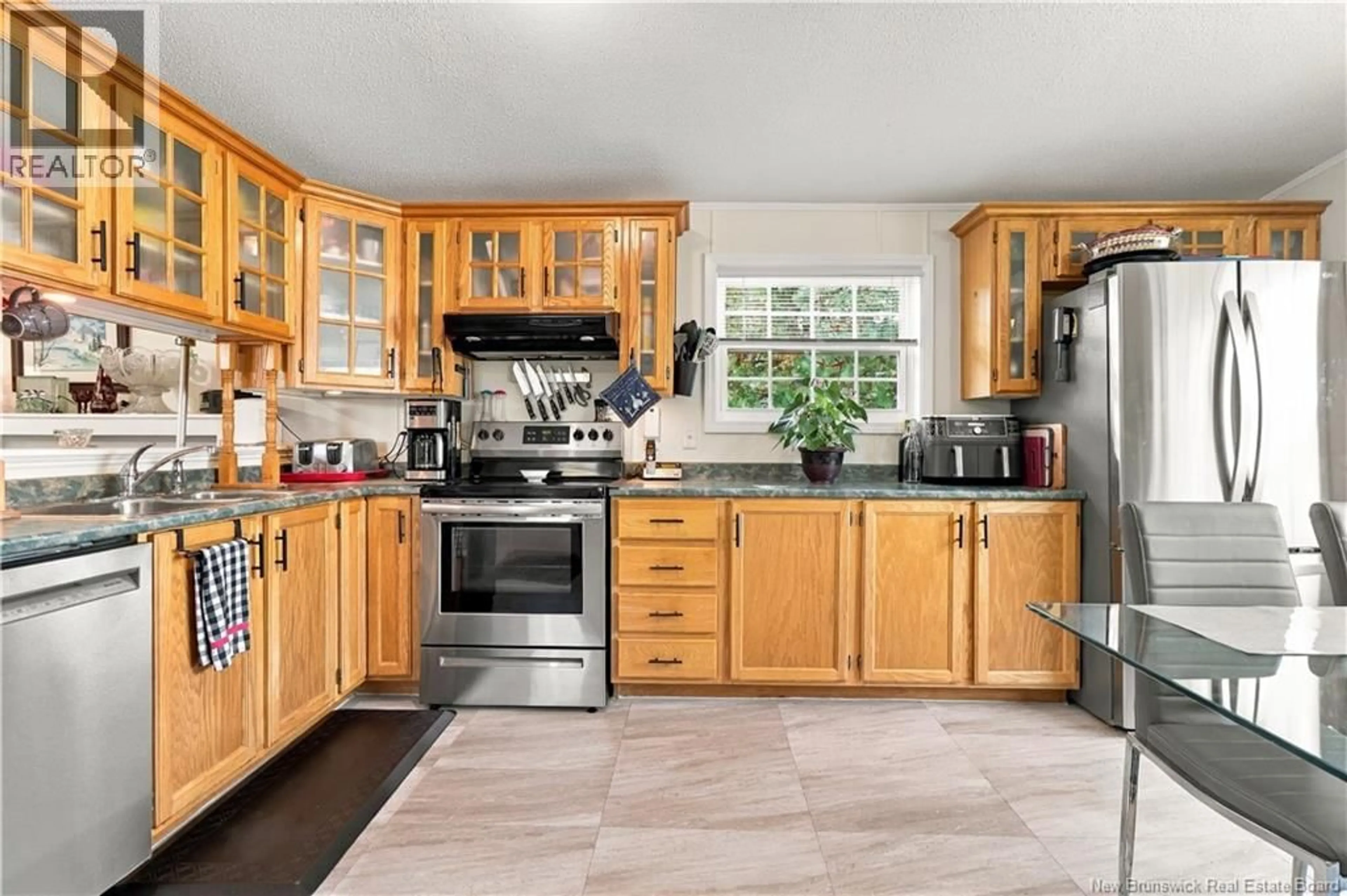 Open concept kitchen, ceramic/tile floor for 48 BARRINGTON ROAD, Fredericton New Brunswick E3C1L8