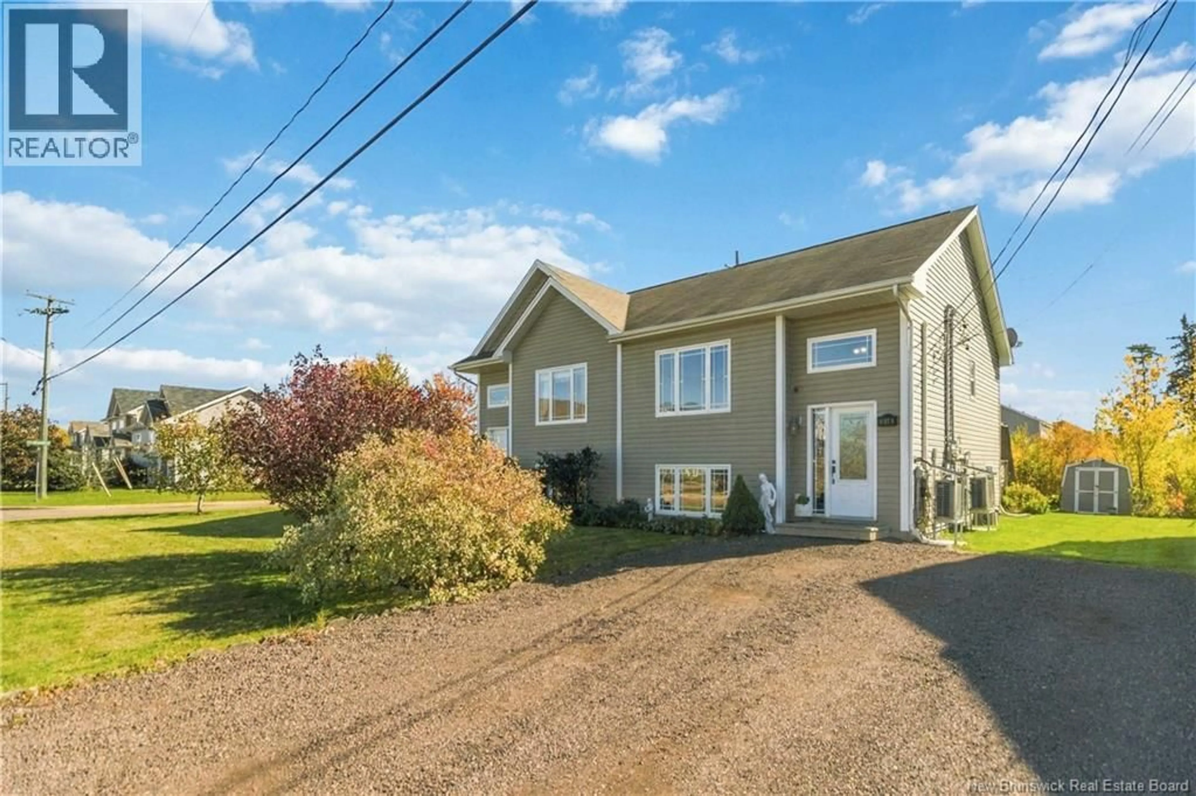 Home with vinyl exterior material, street for 136 HOLLAND DRIVE, Moncton New Brunswick E1G0W1
