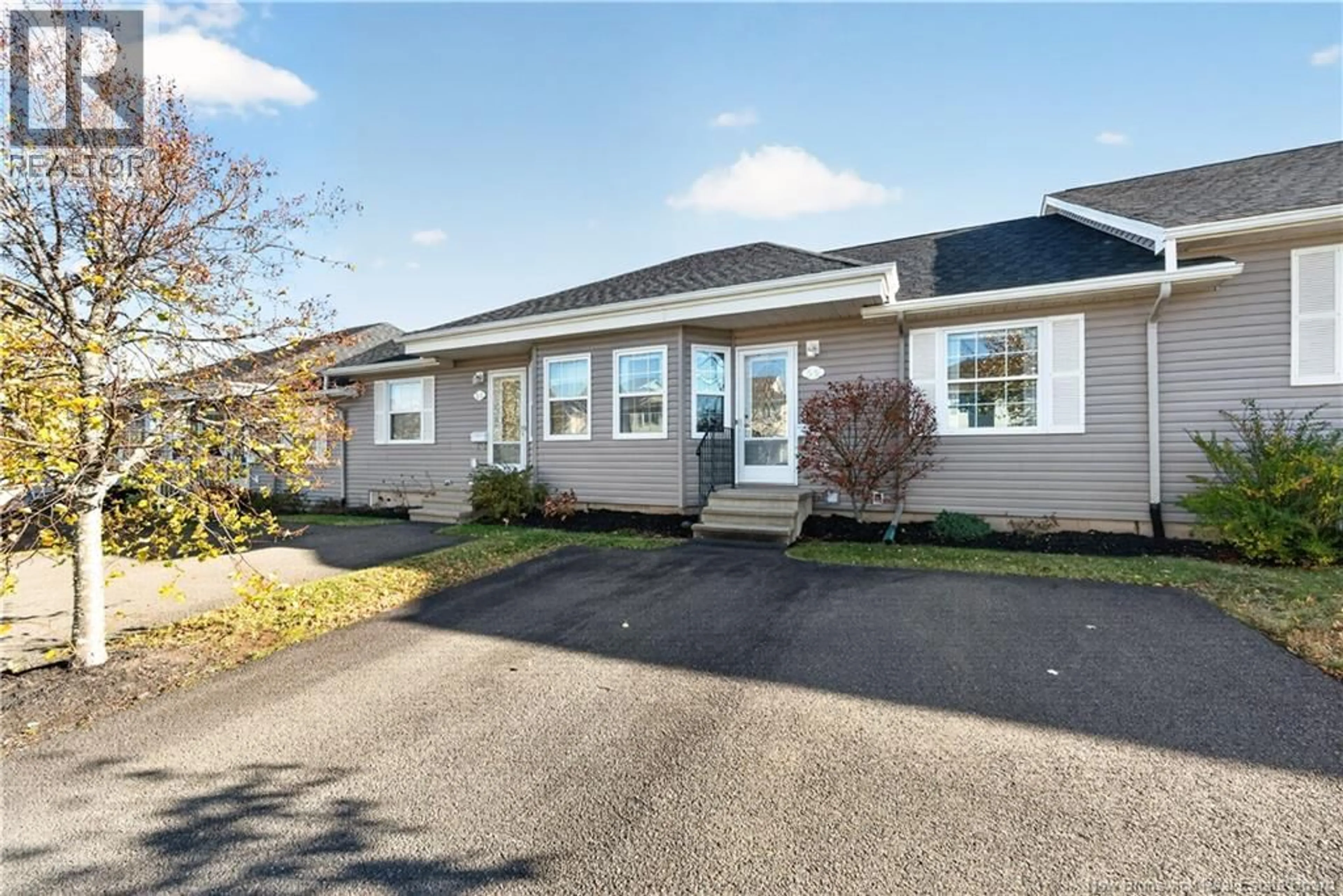 Home with vinyl exterior material, street for 59 DOMETHILDE CRESCENT, Dieppe New Brunswick E1A8R4