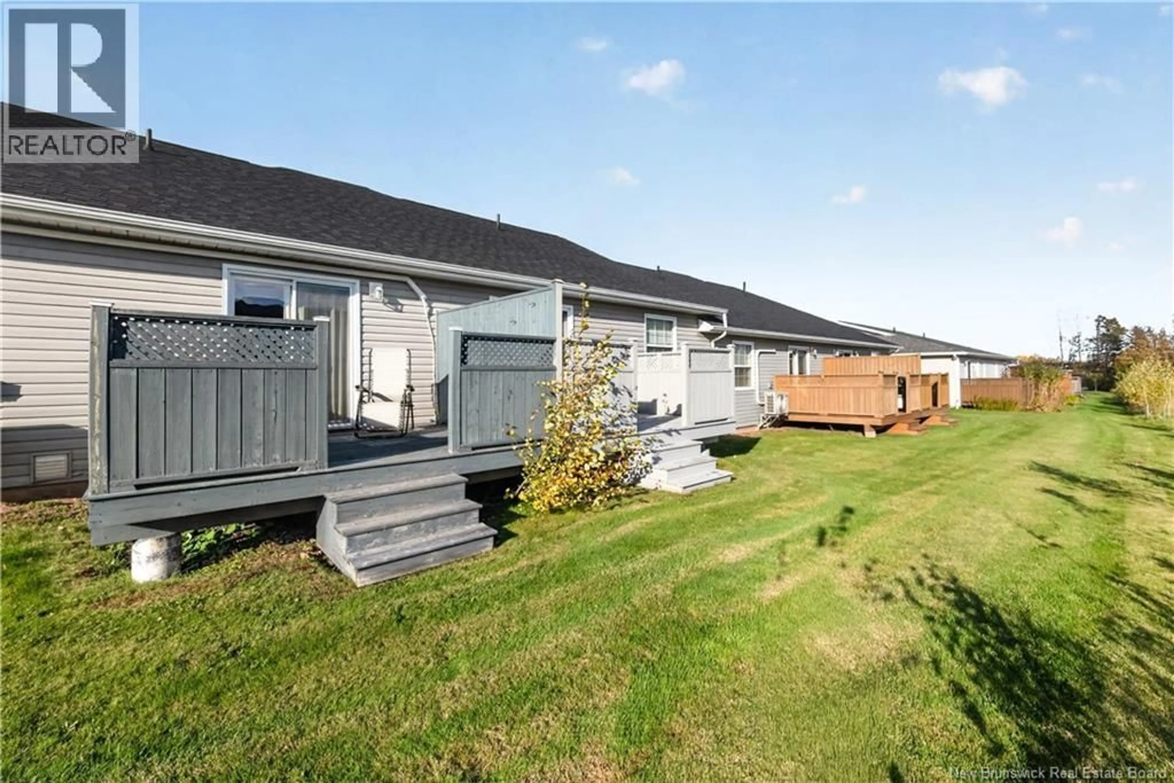 A pic from outside/outdoor area/front of a property/back of a property/a pic from drone, unknown for 59 DOMETHILDE CRESCENT, Dieppe New Brunswick E1A8R4