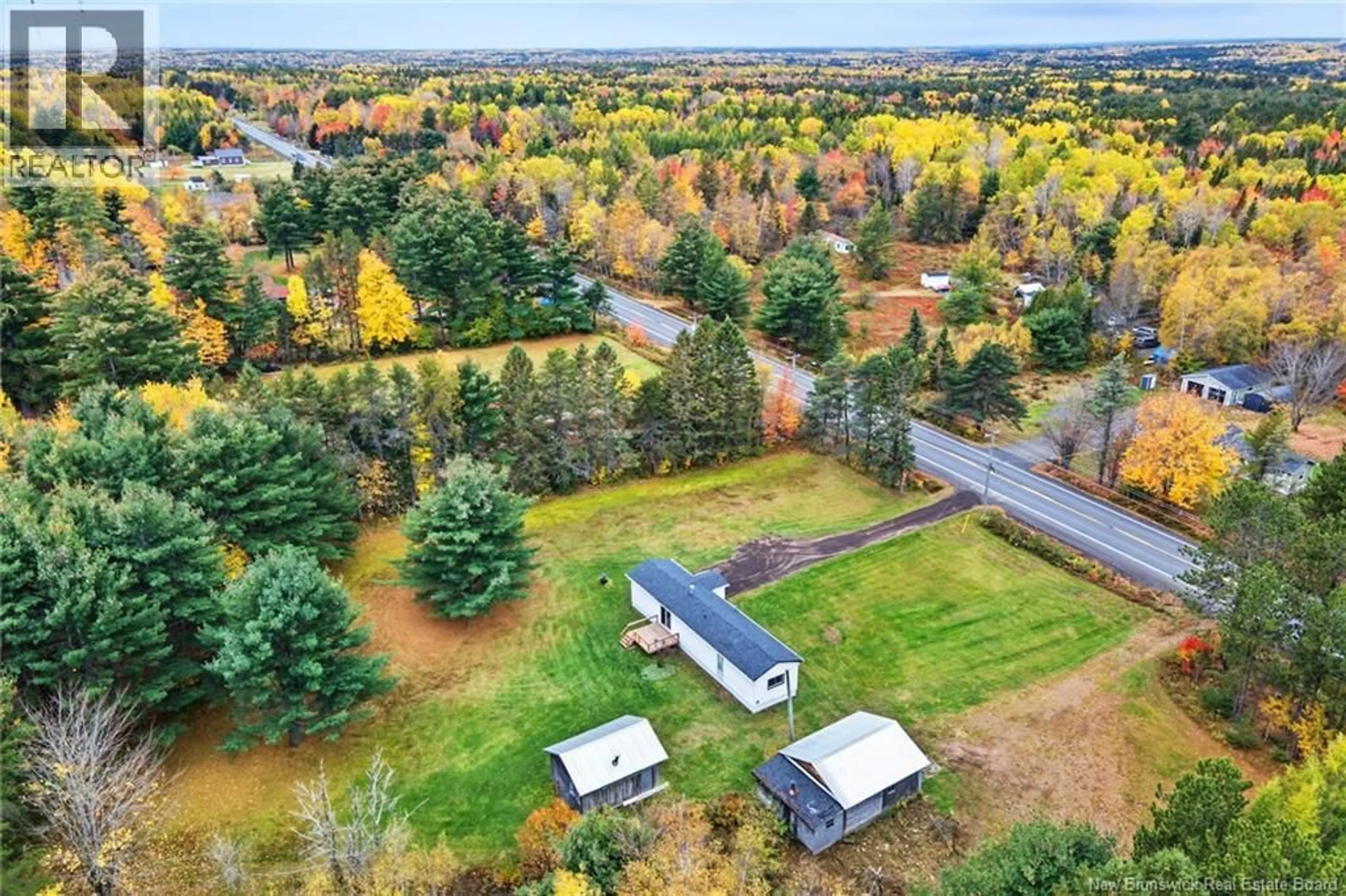 A pic from outside/outdoor area/front of a property/back of a property/a pic from drone, unknown for 1480 PLEASANT DRIVE, Minto New Brunswick E4B2V9