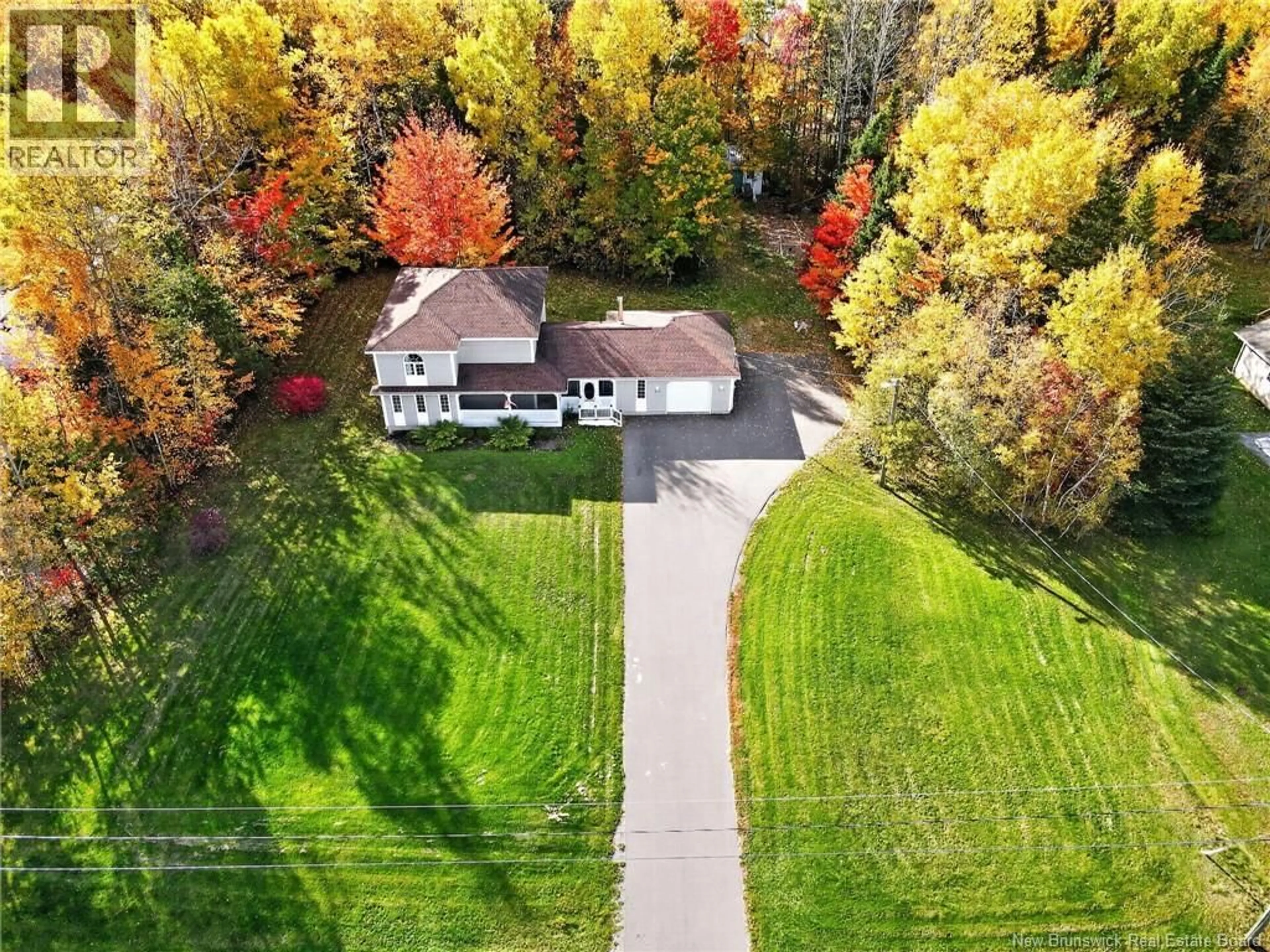 A pic from outside/outdoor area/front of a property/back of a property/a pic from drone, unknown for 67 MANOR RIDGE, Lower Coverdale New Brunswick E1J1J4
