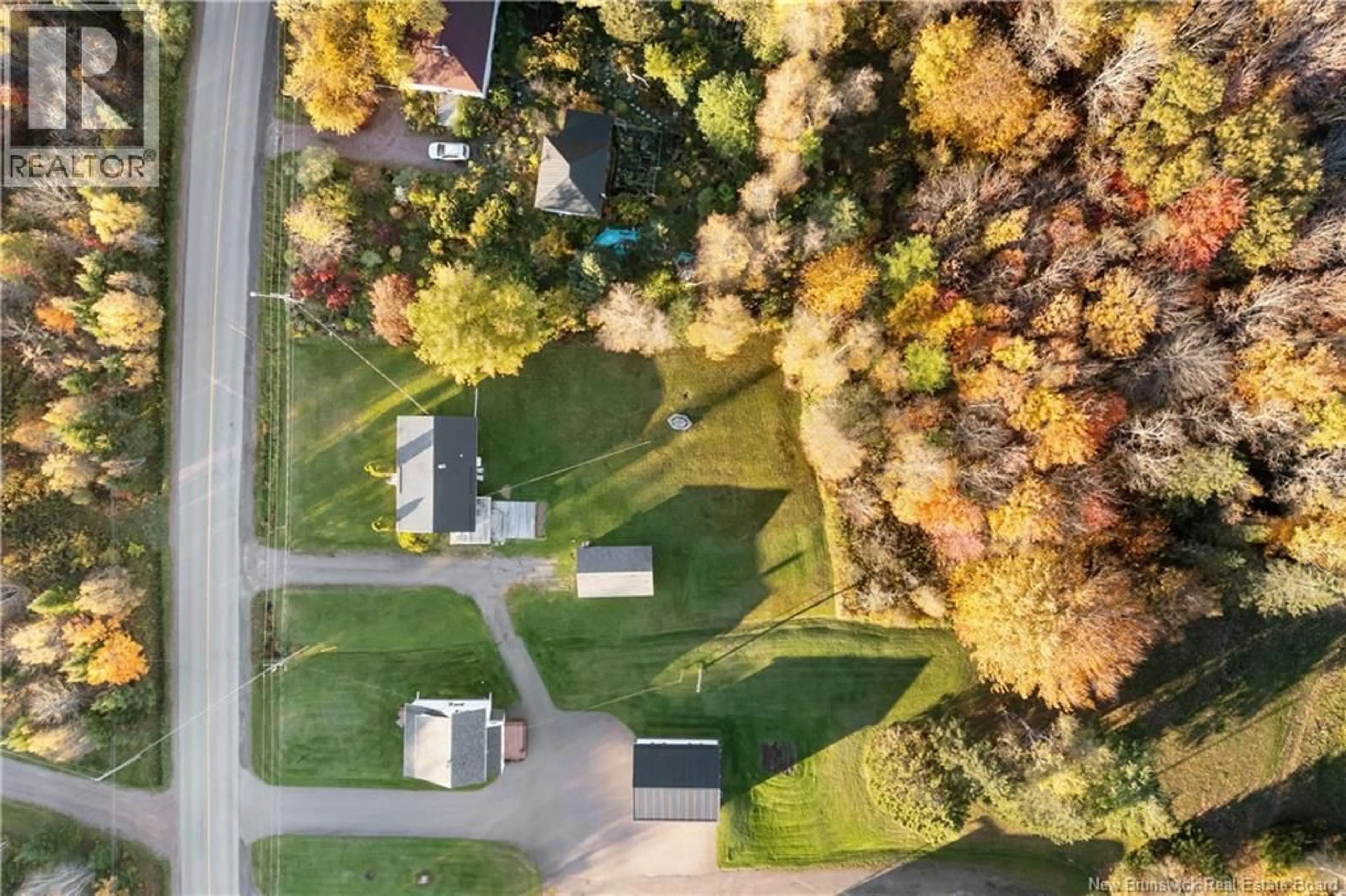 A pic from outside/outdoor area/front of a property/back of a property/a pic from drone, street for 2766 ROUTE 132, Scoudouc New Brunswick E4P1B7