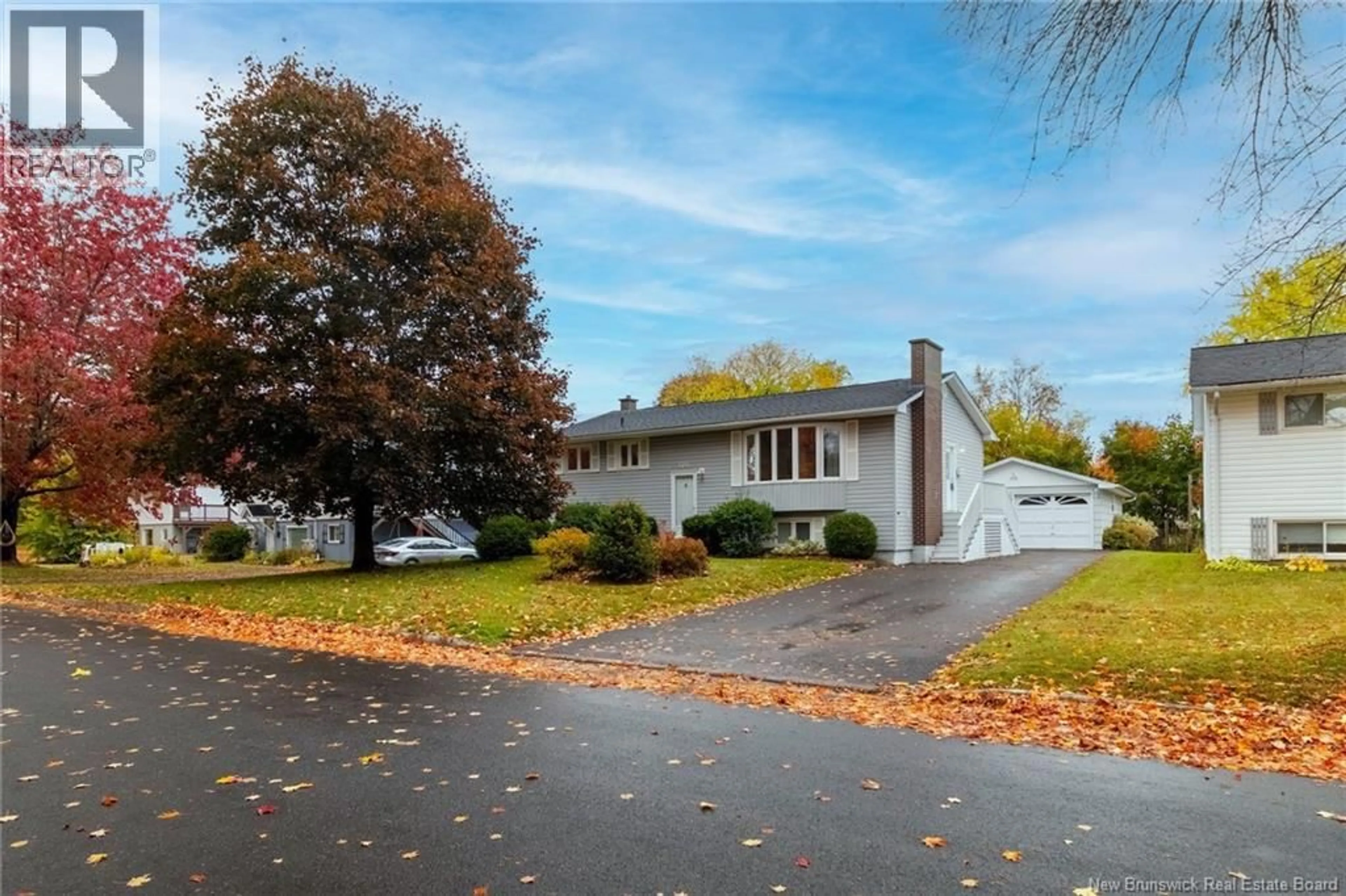 Home with vinyl exterior material, street for 106 HEMLOCK AVENUE, Fredericton New Brunswick E3A1H1