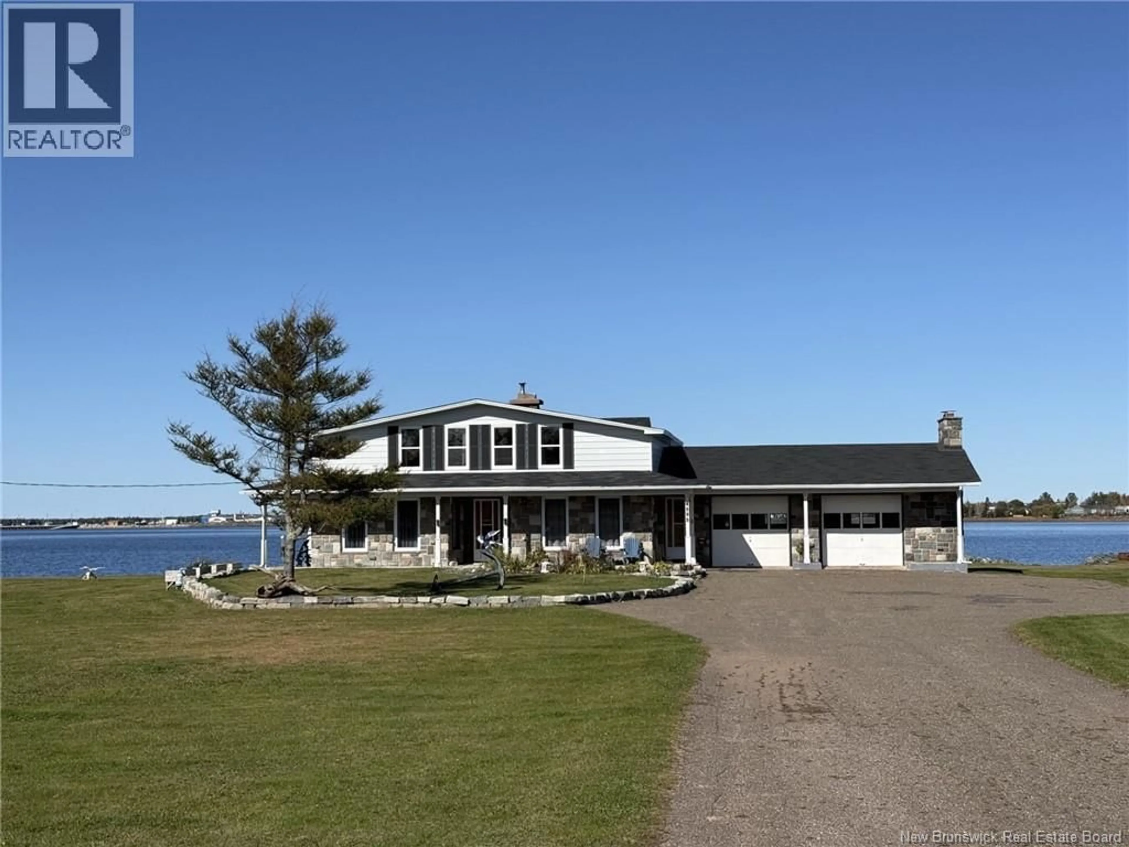 A pic from outside/outdoor area/front of a property/back of a property/a pic from drone, water/lake/river/ocean view for 4595 ROUTE 113, Haut-Lamèque New Brunswick E8T3L5
