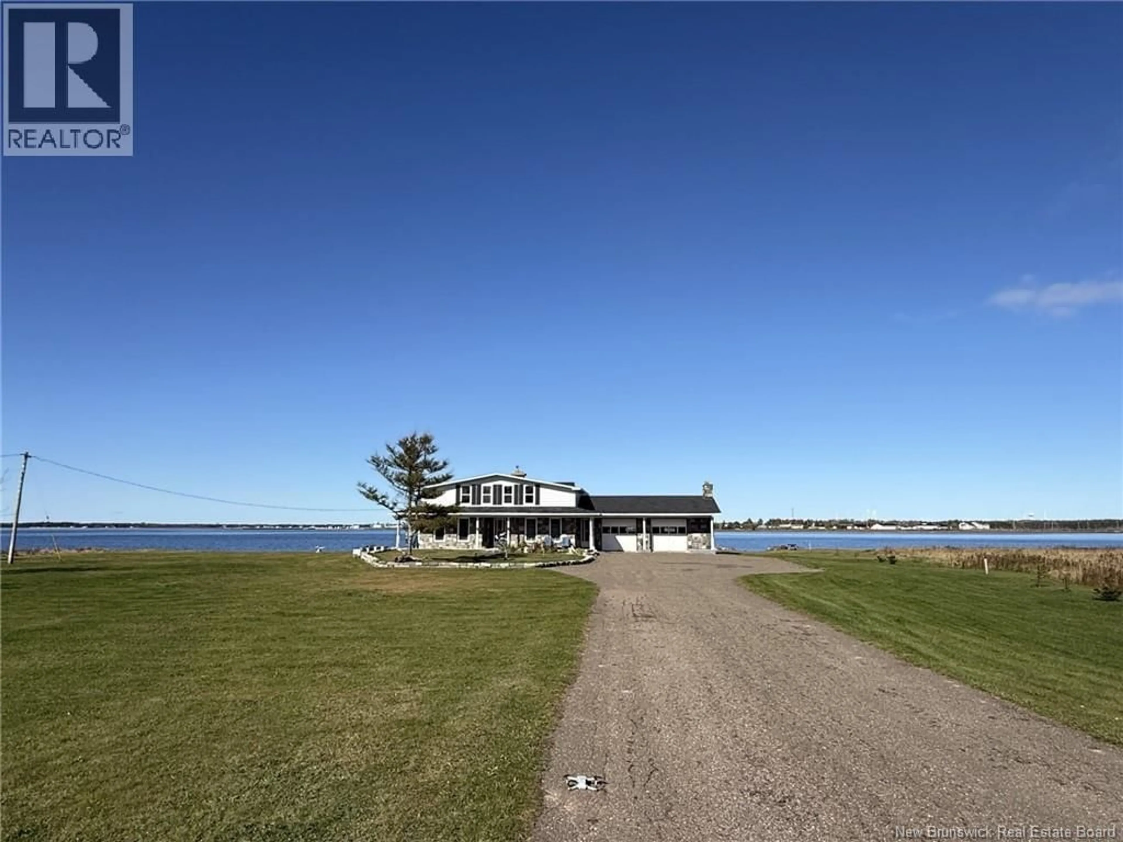 A pic from outside/outdoor area/front of a property/back of a property/a pic from drone, water/lake/river/ocean view for 4595 ROUTE 113, Haut-Lamèque New Brunswick E8T3L5