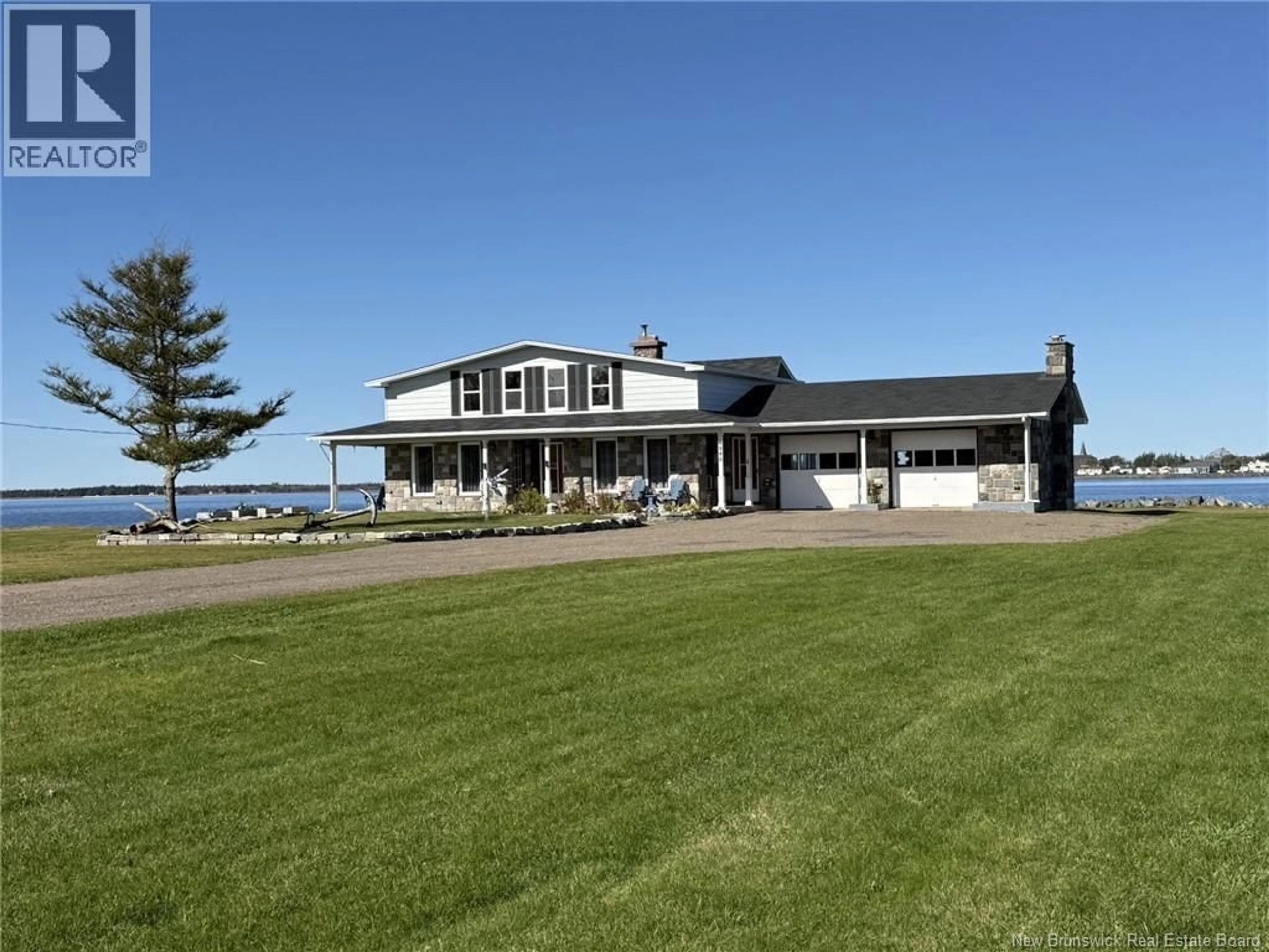A pic from outside/outdoor area/front of a property/back of a property/a pic from drone, water/lake/river/ocean view for 4595 ROUTE 113, Haut-Lamèque New Brunswick E8T3L5