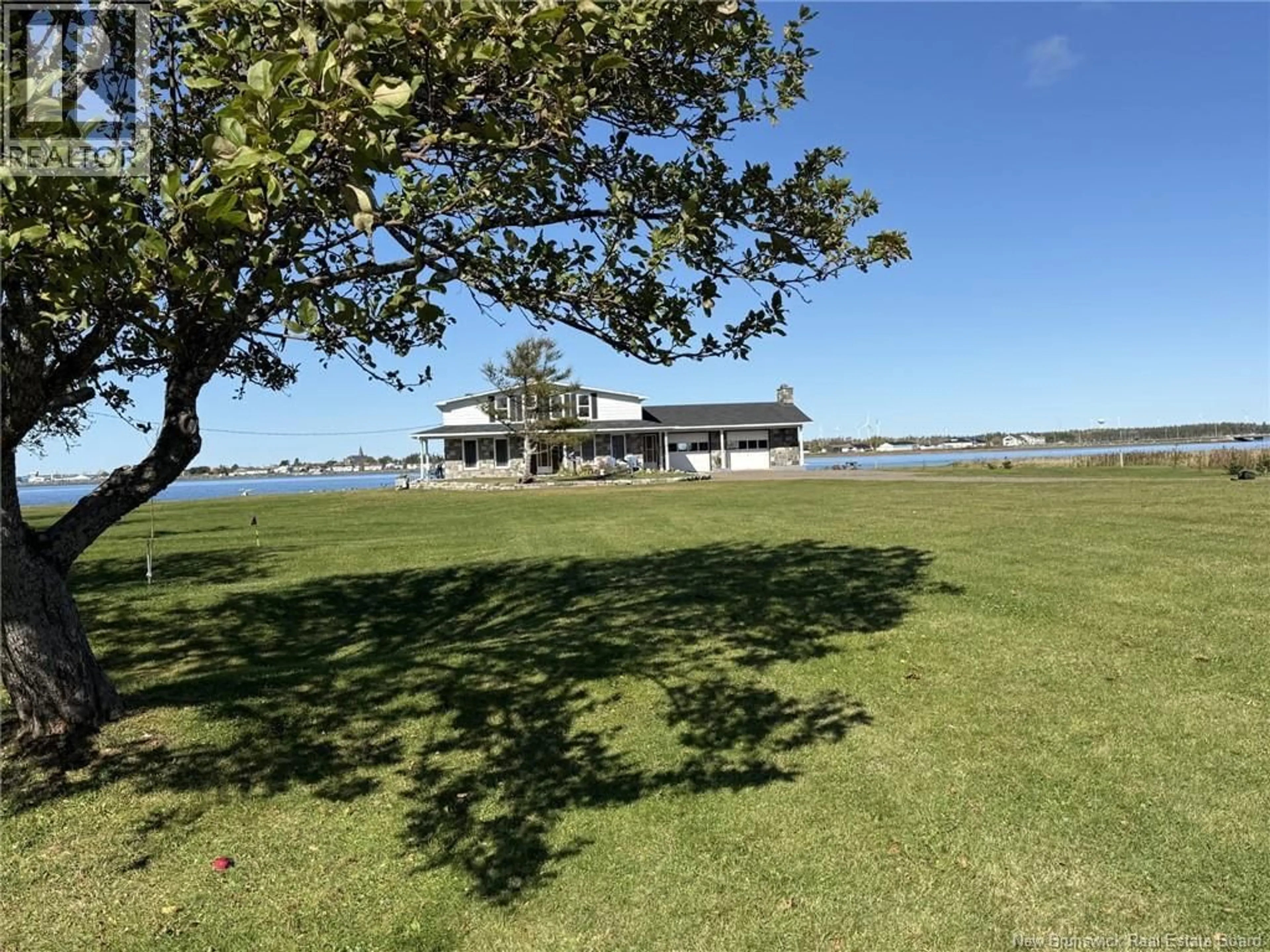 A pic from outside/outdoor area/front of a property/back of a property/a pic from drone, water/lake/river/ocean view for 4595 ROUTE 113, Haut-Lamèque New Brunswick E8T3L5
