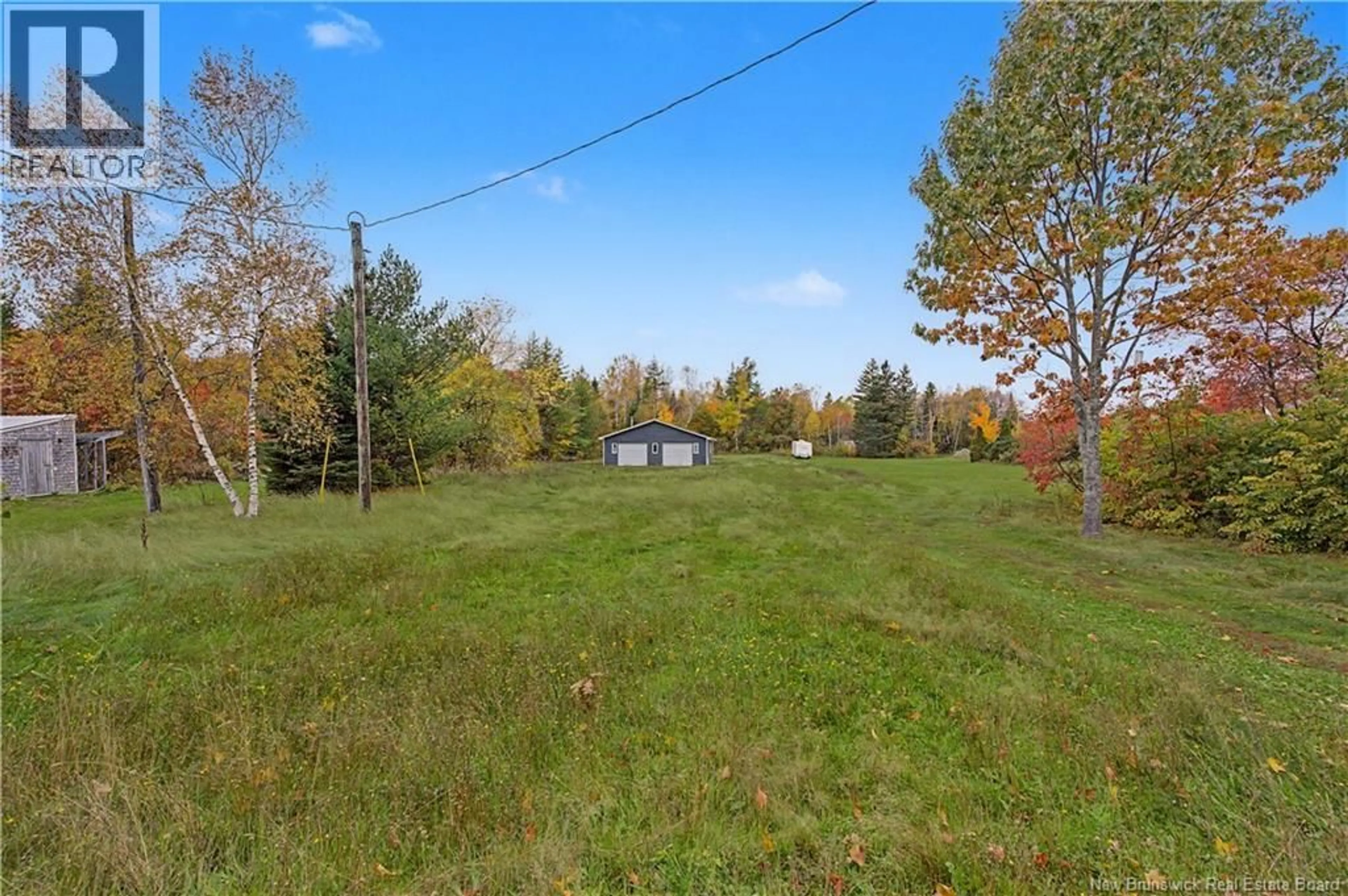 A pic from outside/outdoor area/front of a property/back of a property/a pic from drone, forest/trees view for 77 CARELTON, Rogersville New Brunswick E4Y1R9
