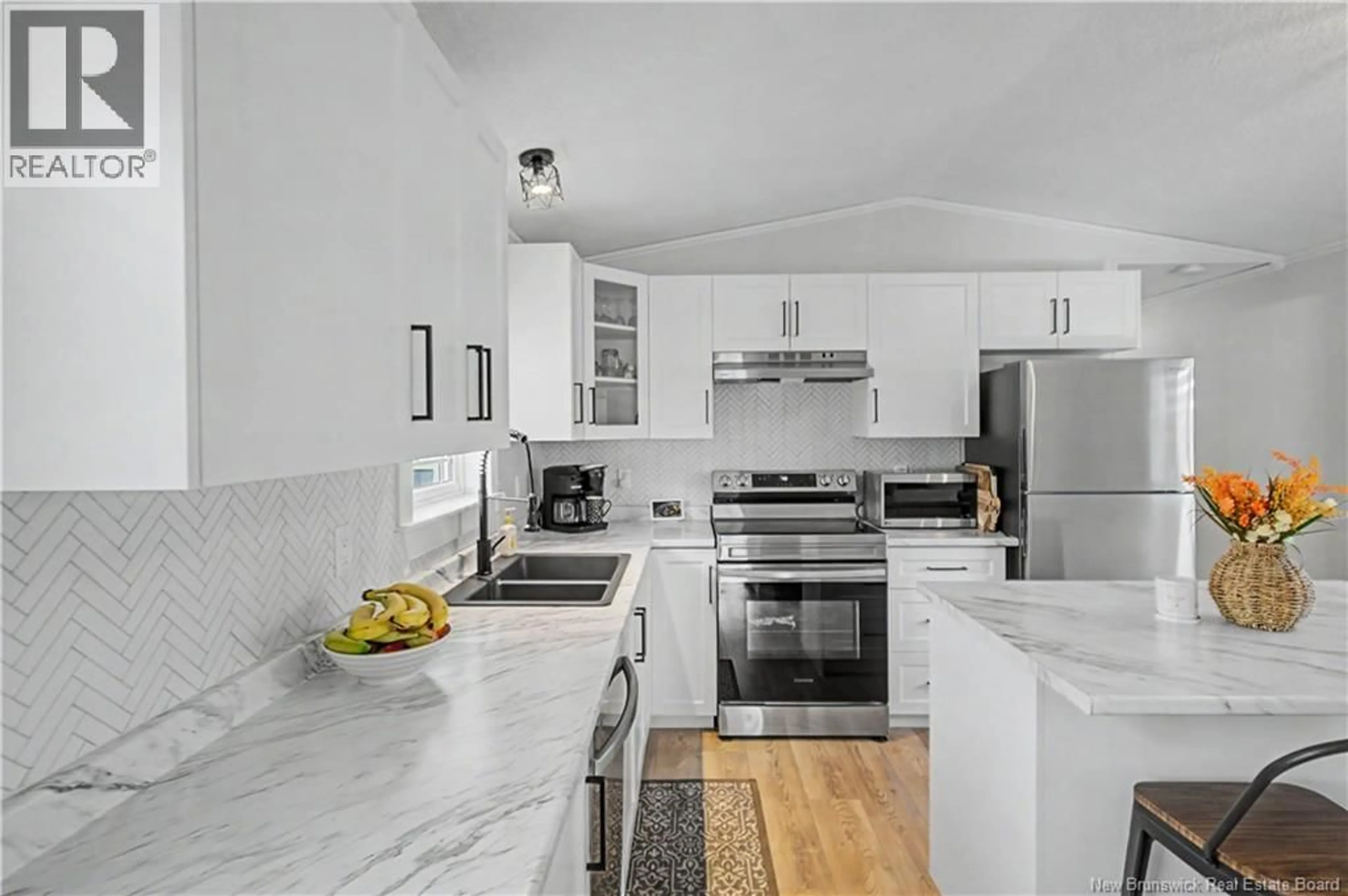 Open concept kitchen, ceramic/tile floor for 46 TRAVIS STREET, Miramichi New Brunswick E1V6A2