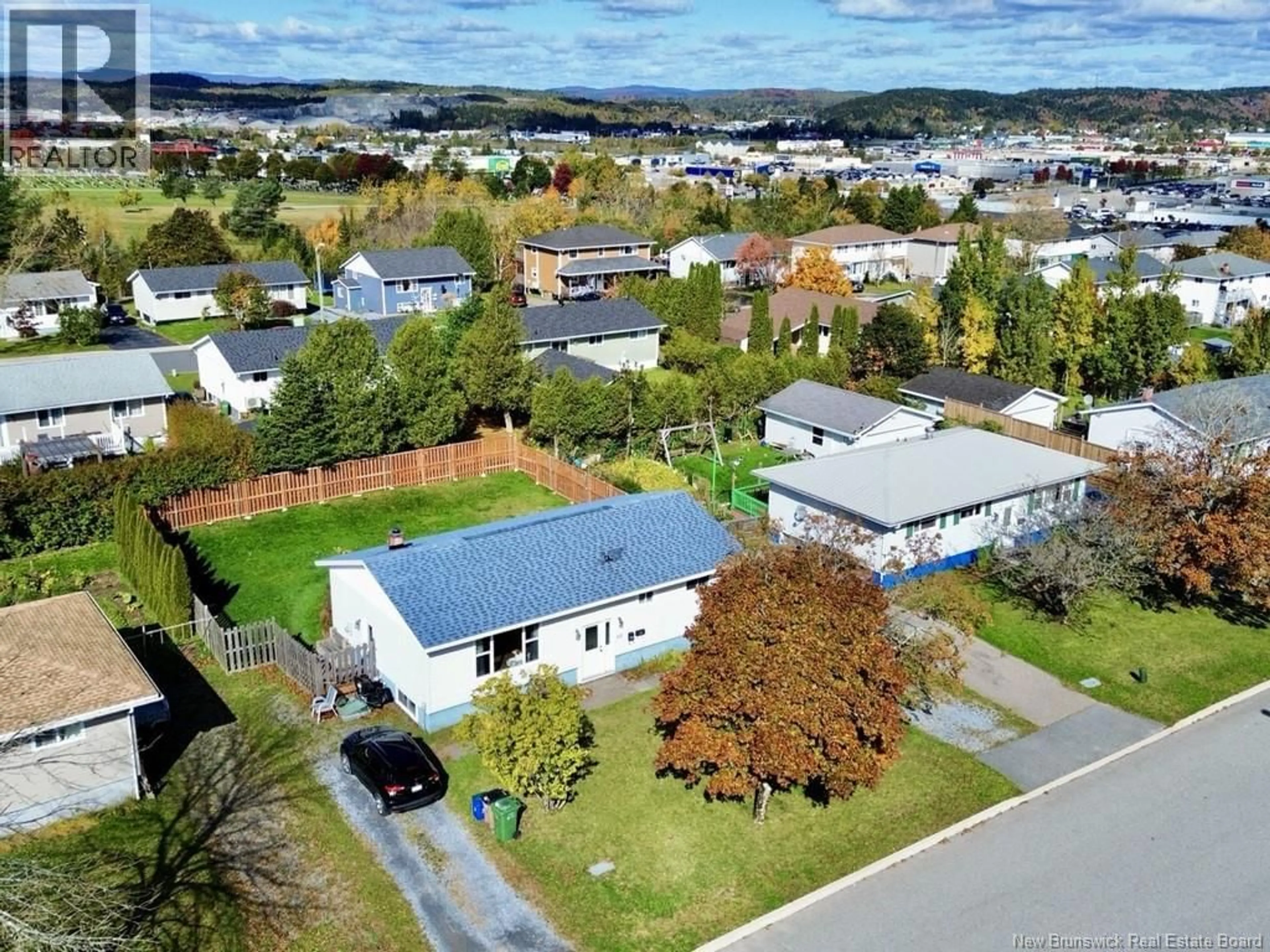 A pic from outside/outdoor area/front of a property/back of a property/a pic from drone, street for 611 BONITA AVENUE, Saint John New Brunswick E2J2T3