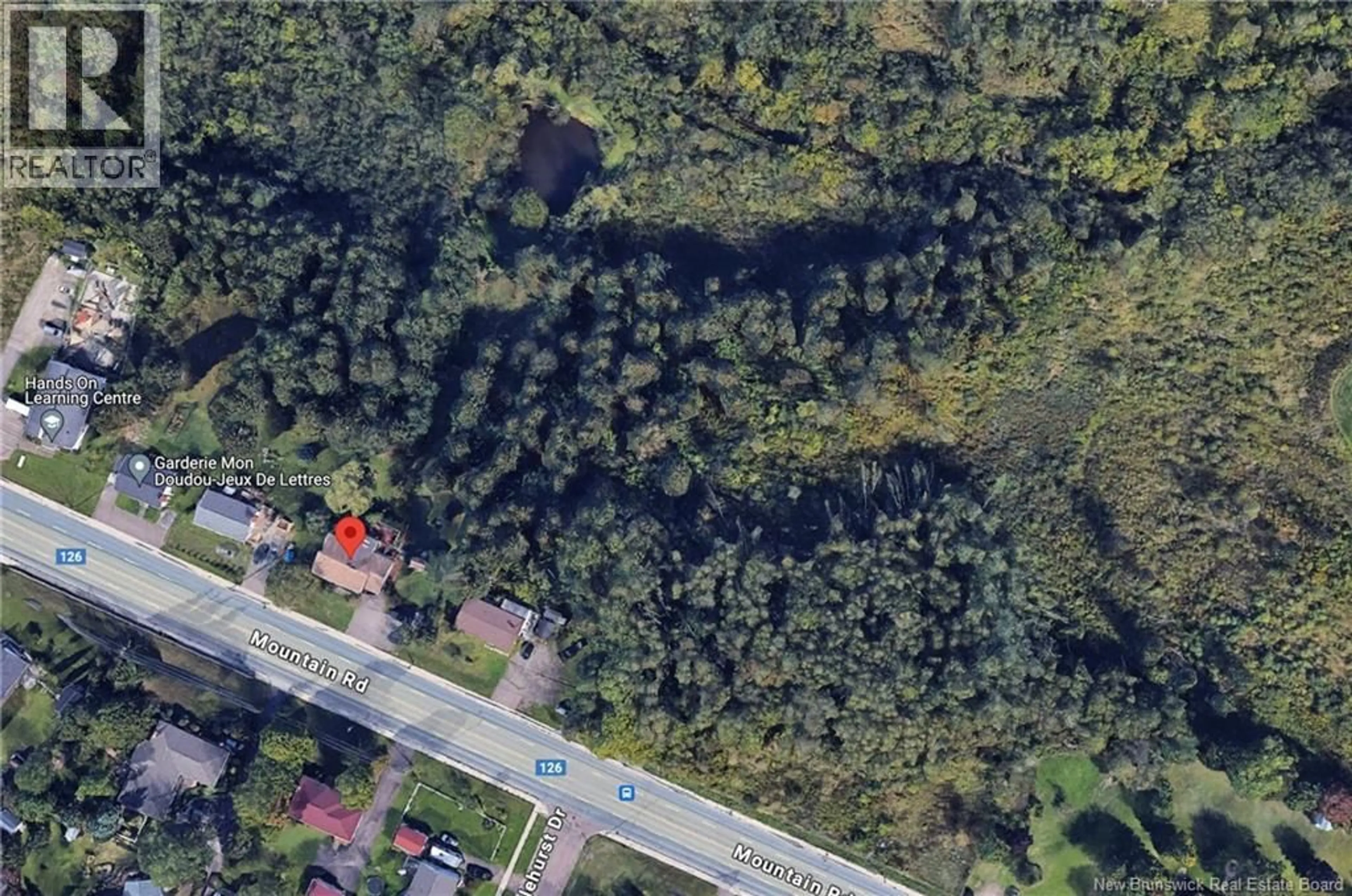 A pic from outside/outdoor area/front of a property/back of a property/a pic from drone, unknown for 2149-2155 MOUNTAIN ROAD, Moncton New Brunswick E1G1B5