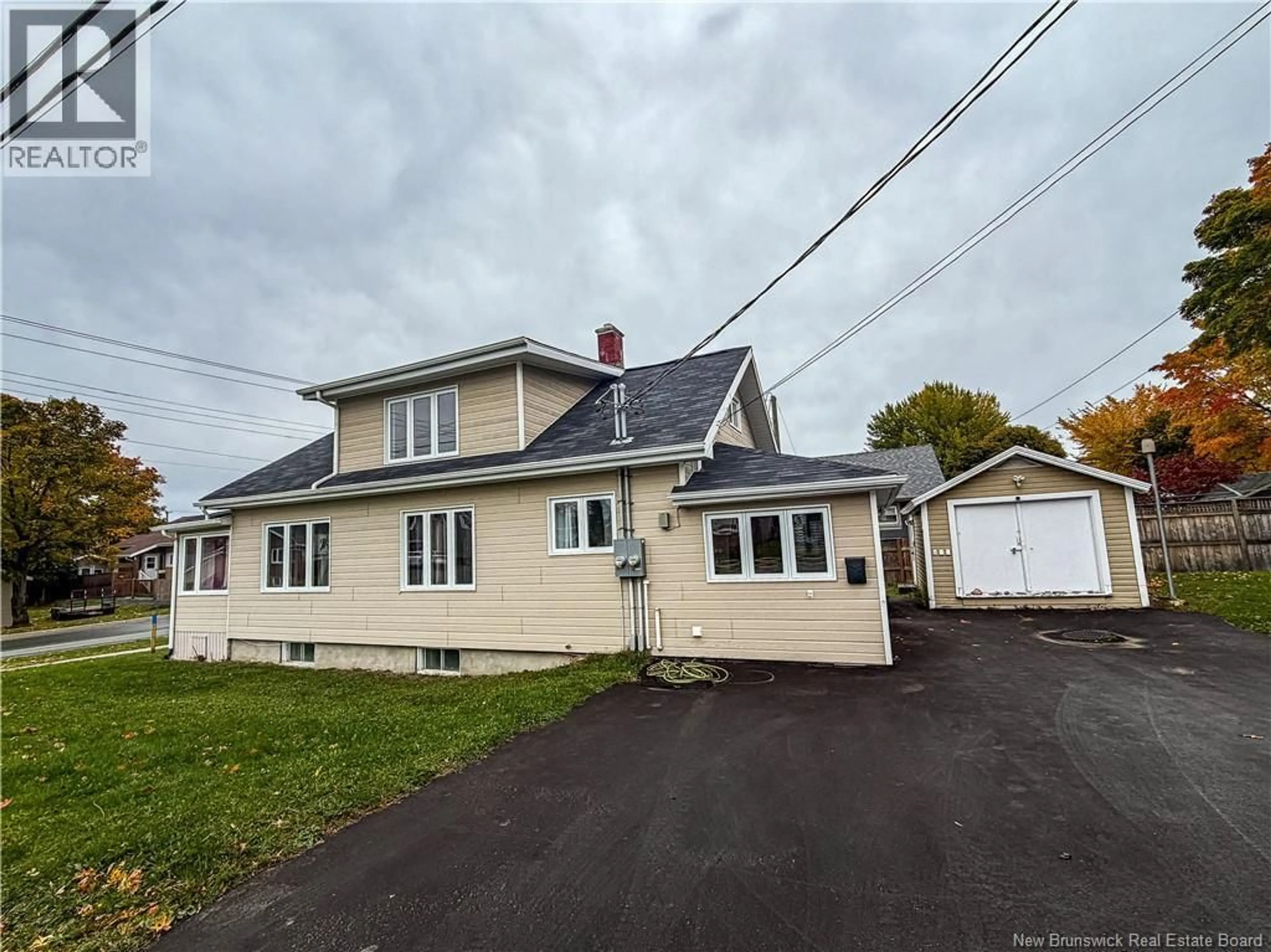 Home with vinyl exterior material, street for 50 VICTORIA STREET, Campbellton New Brunswick E3N1J2