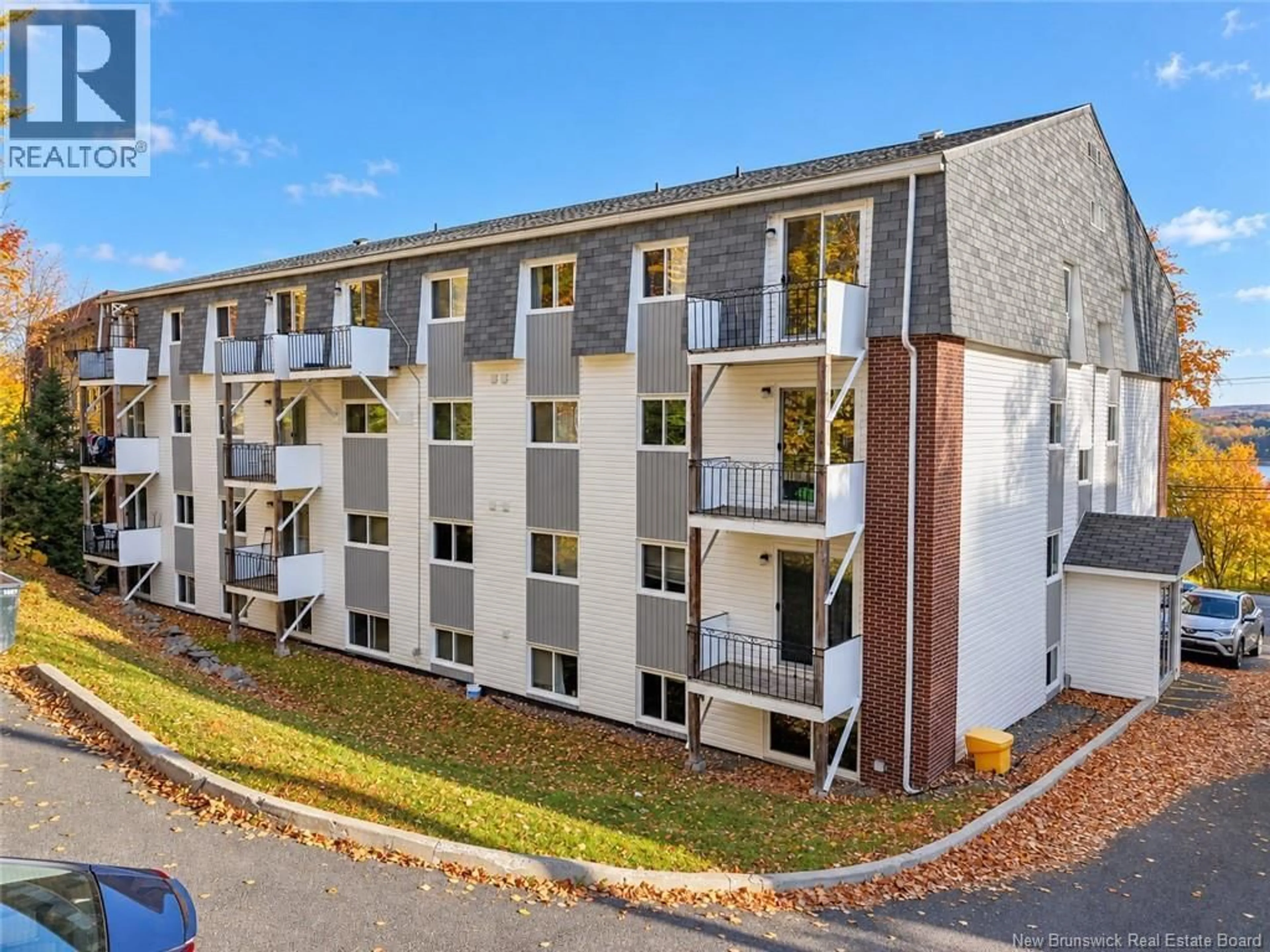 A pic from outside/outdoor area/front of a property/back of a property/a pic from drone, building for 1 - 228 DUNNS CROSSING ROAD, Fredericton New Brunswick E3B2A6
