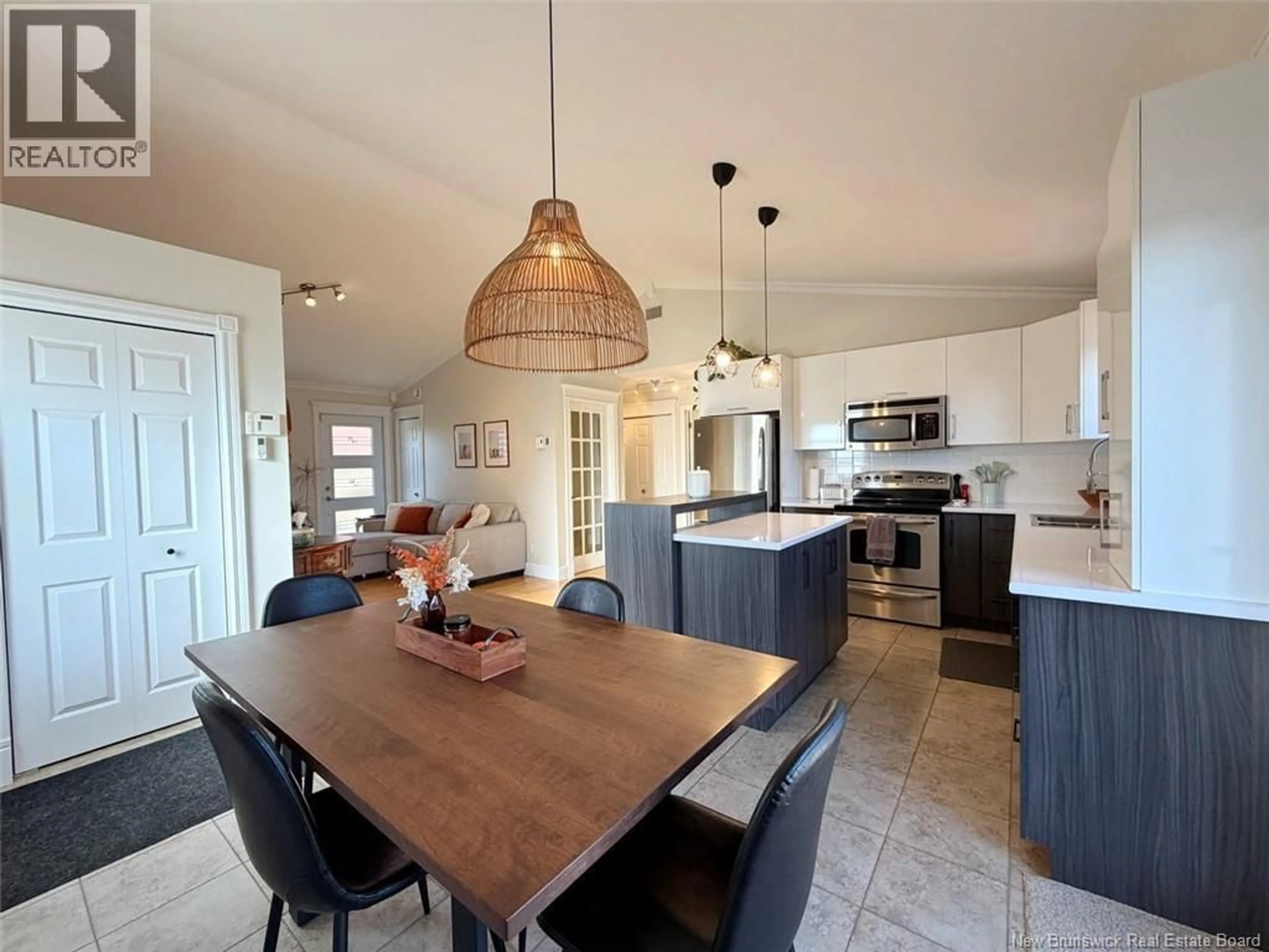 Open concept kitchen, ceramic/tile floor for 97 OLIVIER BOUCHER ROAD, Edmundston New Brunswick E3V4X1